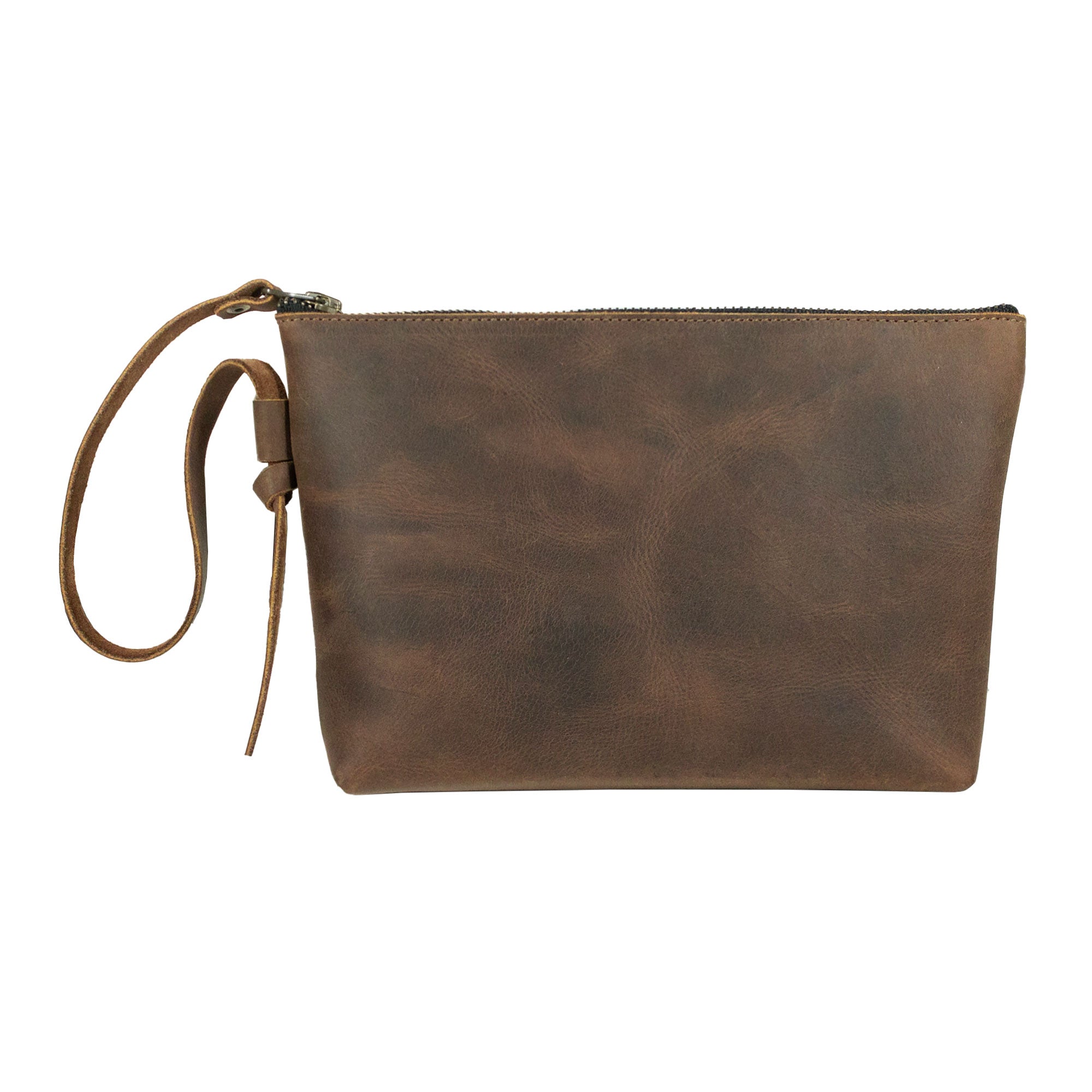Back view of Heather's Clutch Bag with Strap, highlighting its sleek design and Full Grain Leather. Perfect as a wrist wallet for cards and money, and great for makeup and cosmetic storage, this bag is artisan handcrafted in La Antigua Guatemala & Oaxaca Mexico.