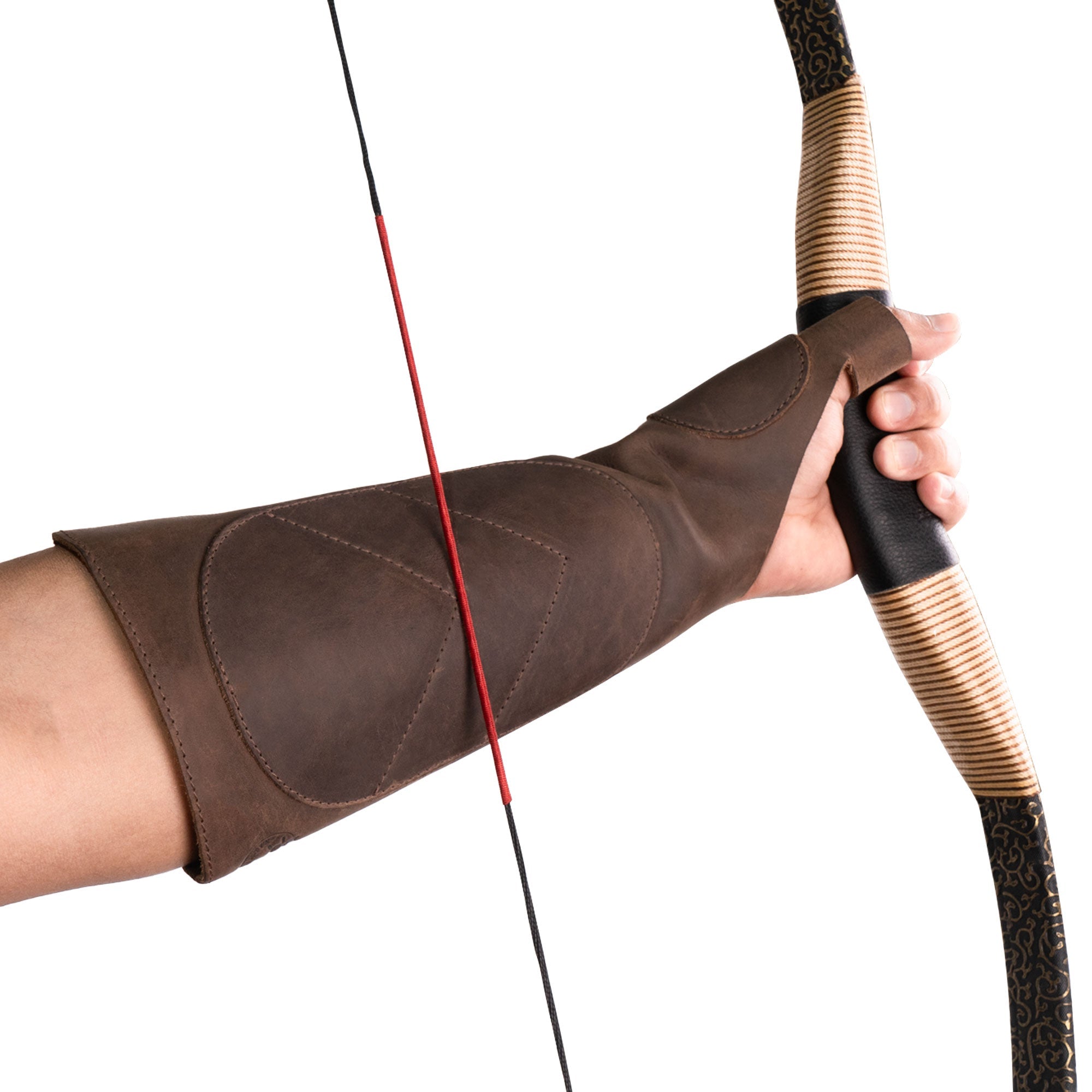 An archer demonstrating the Forearm Guard for Archers from Valhalla Gear while holding a bow. This bracer is crafted from full grain leather, providing essential forearm protection for men, women, and youth. A great choice for durable bow archery sleeve arm guards made using artisan techniques in La Antigua Guatemala & Oaxaca Mexico.
