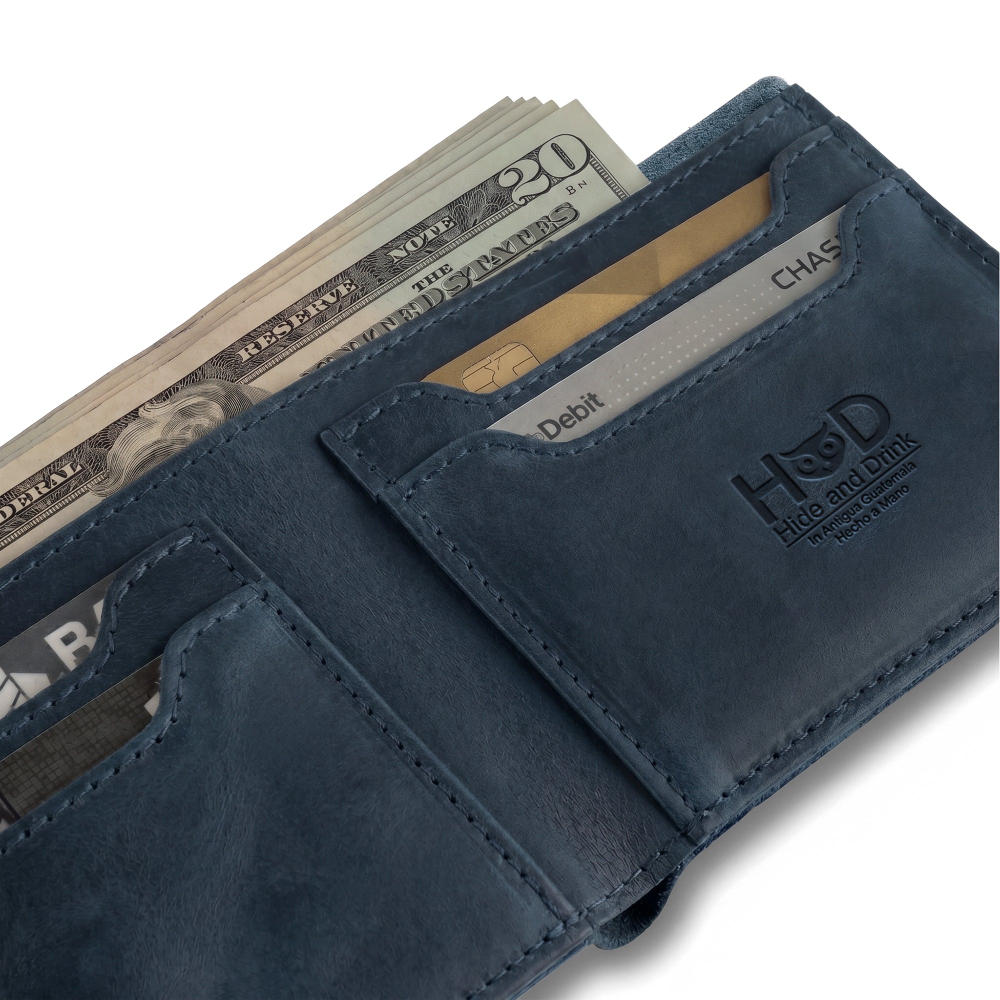 Elegant dark brown Classic Wallet from Hide & Drink with a practical design. This Classic Bifold Wallet serves as a stylish storage case for identification, crafted from Full Grain Leather. Ideal for travel, it showcases artisan skills through small batch production, hand cut and sewn in La Antigua Guatemala & Oaxaca Mexico.