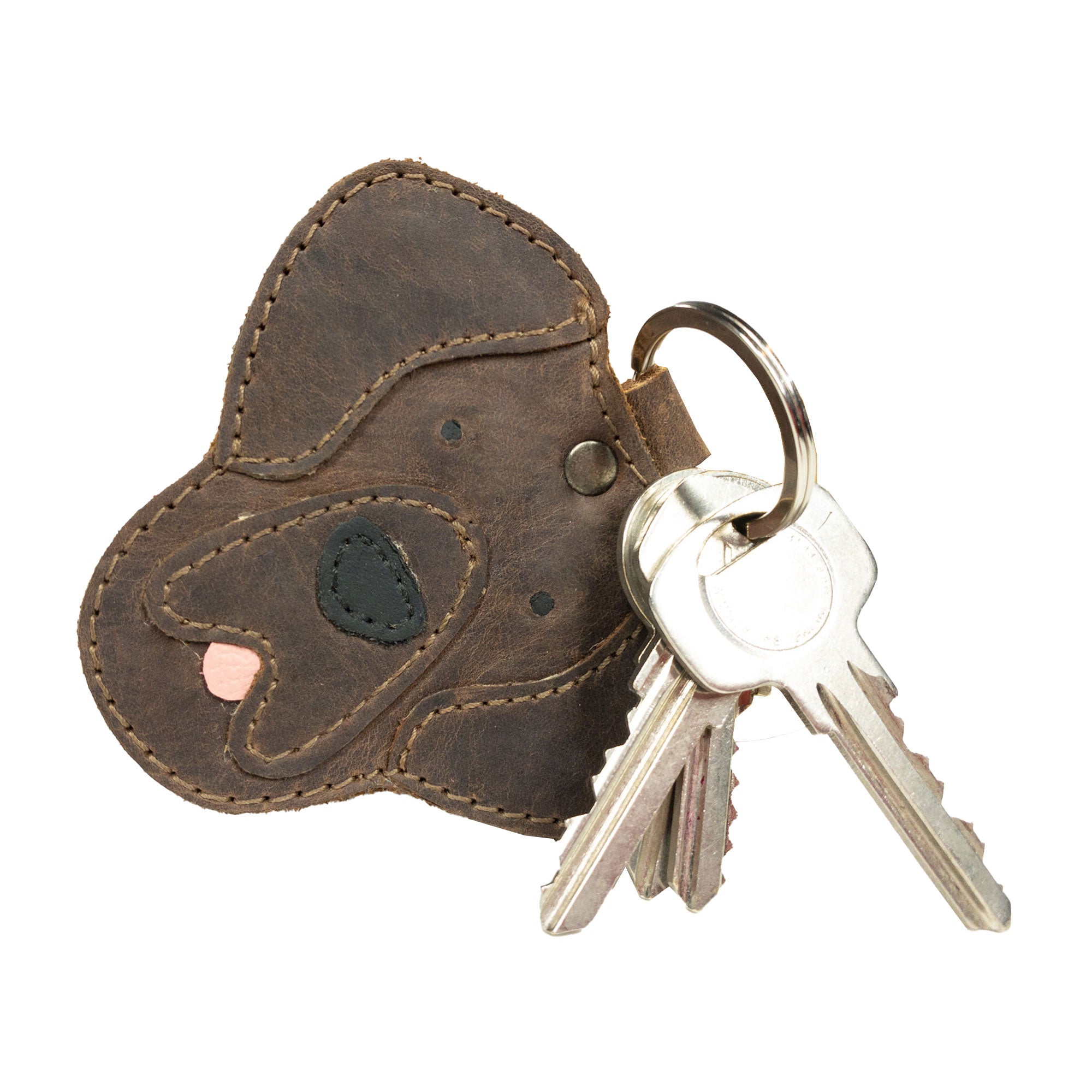 Labrador Dog Critter Keychain by Taco Dog, beautifully crafted from Full Grain Leather, showcasing its cute features. This handmade keychain is part of small batch production, highlighting artisan craftsmanship with hand cut and fire branded elements, perfect for Labrador lovers.