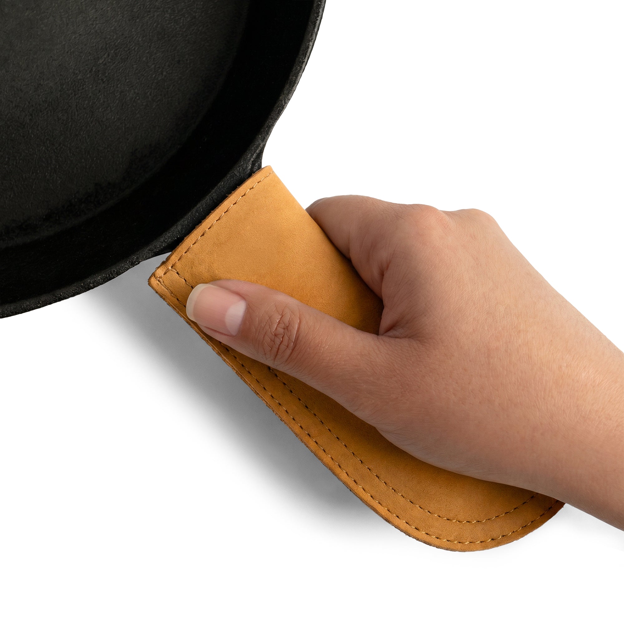 Hide & Drink Cast Iron Panhandle Cover highlighted against a clean background. This artisan hot handle protector is made from durable full grain leather and features a double stitched design. Crafted in La Antigua Guatemala & Oaxaca Mexico, it's perfect for any kitchen setup.