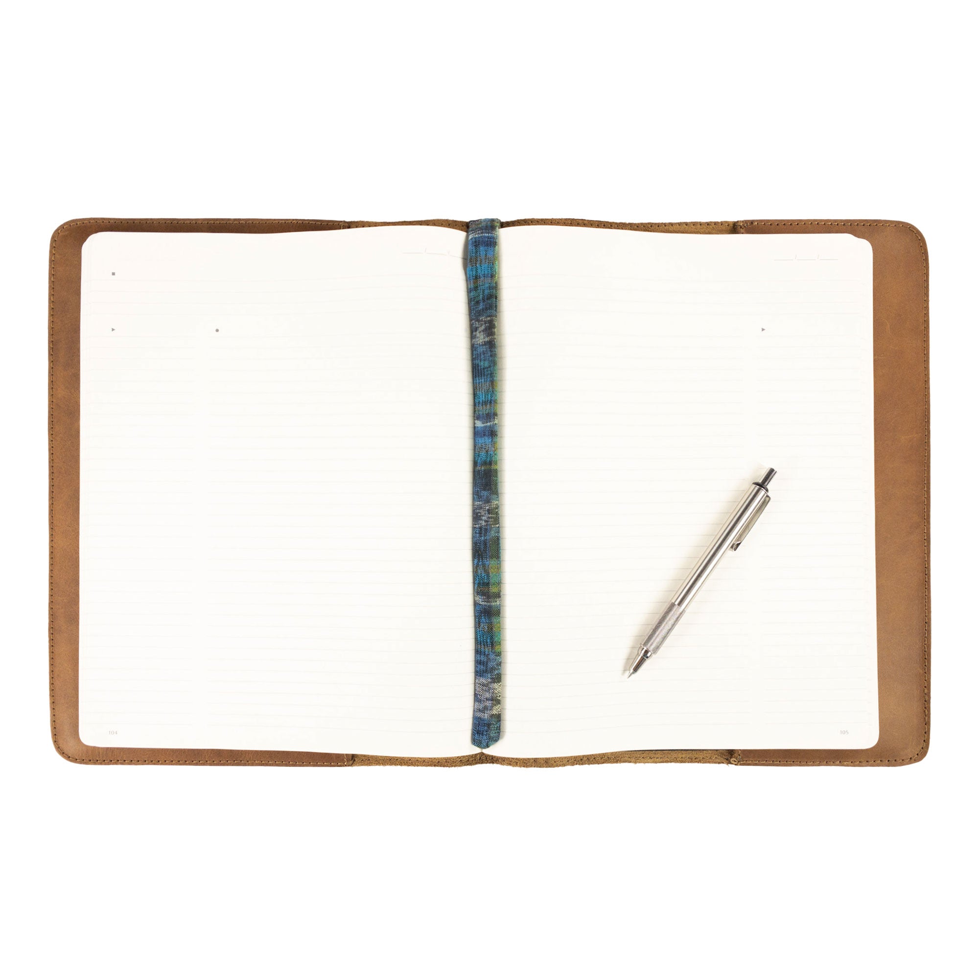 The Journal Cover for (8.5 x 11 in.) Moleskine Cahier XXL presented by Hide & Drink focusing on its unique handmade quality and stylish appeal. An excellent protector for your writing tools, made in La Antigua Guatemala & Oaxaca Mexico.