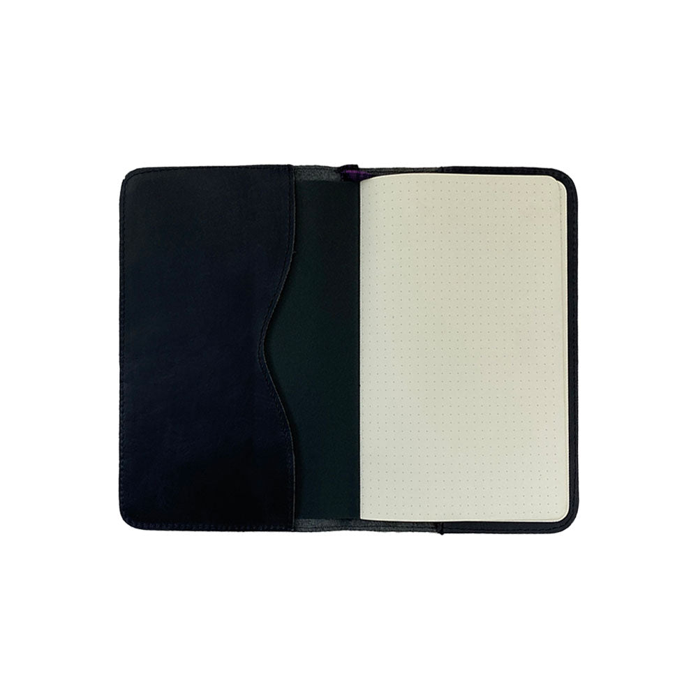 Open view of a Journal Cover for Moleskine Cahier L (5 x 8.25 in.) in tan leather by Hide & Drink. This refillable rustic protector is designed for large size (5 x 8.25 in.) notebooks and shows off superior artisan craftsmanship from full grain leather.