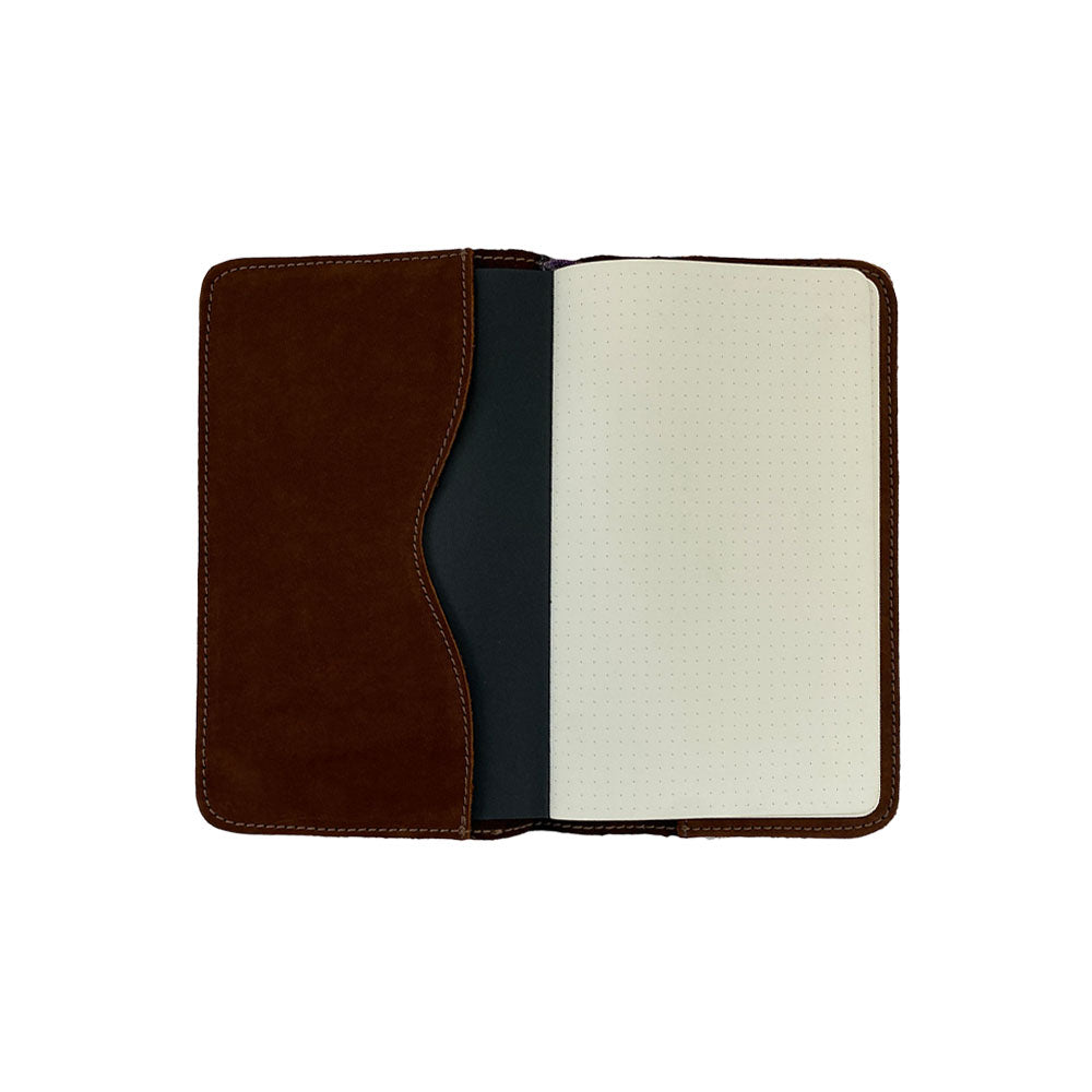 Front view of an artisan brown Journal Cover for Moleskine Cahier L (5 x 8.25 in.) by Hide & Drink. This refillable protector, suitable for large size (5 x 8.25 in.) notebooks, beautifully highlights the quality of full grain leather.
