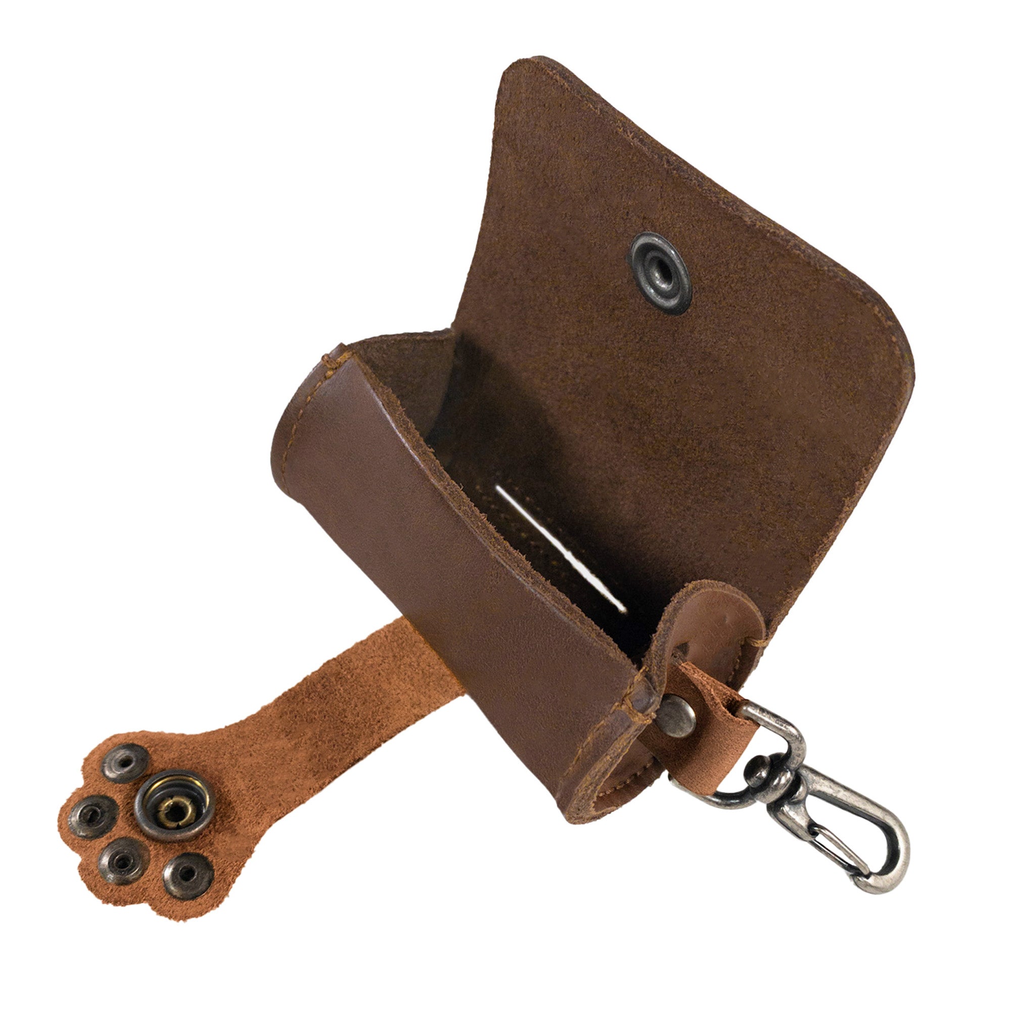 Open Taco Dog Paw Poop Bag Pouch revealing inner compartment for easy bag dispensing. Crafted from full grain leather, this pouch is perfect for dog owners needing a convenient, easy cleanup solution on walks. Handmade with care in La Antigua Guatemala, reflecting artisan quality.