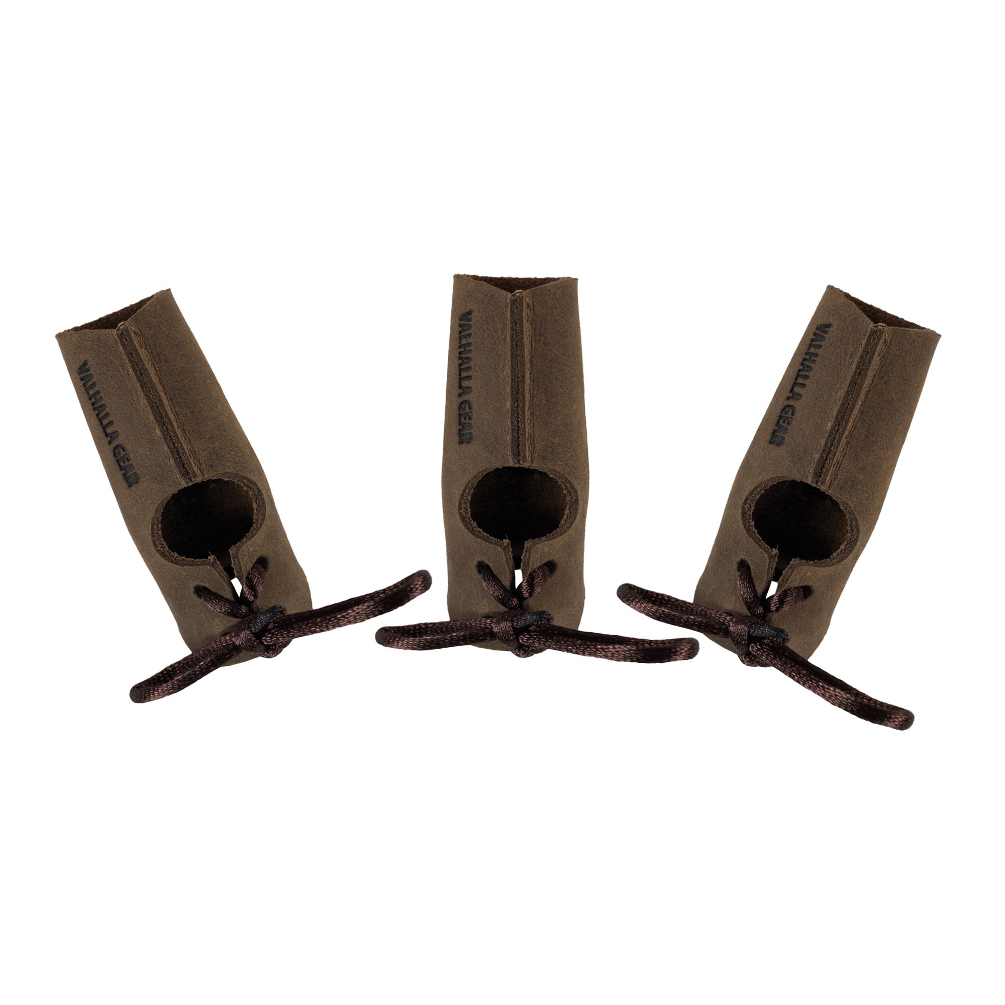 Showing the unique design of the Set of 3 Finger Protectors for Archery by Valhalla Gear. Made from full grain leather, these finger guards are perfect for archer accessories, recurve bows, and shooting targeting. They exemplify artisanal craftsmanship with their hand cut and hand sewn details along with fire branding, reflecting the quality of small batch production from La Antigua Guatemala.