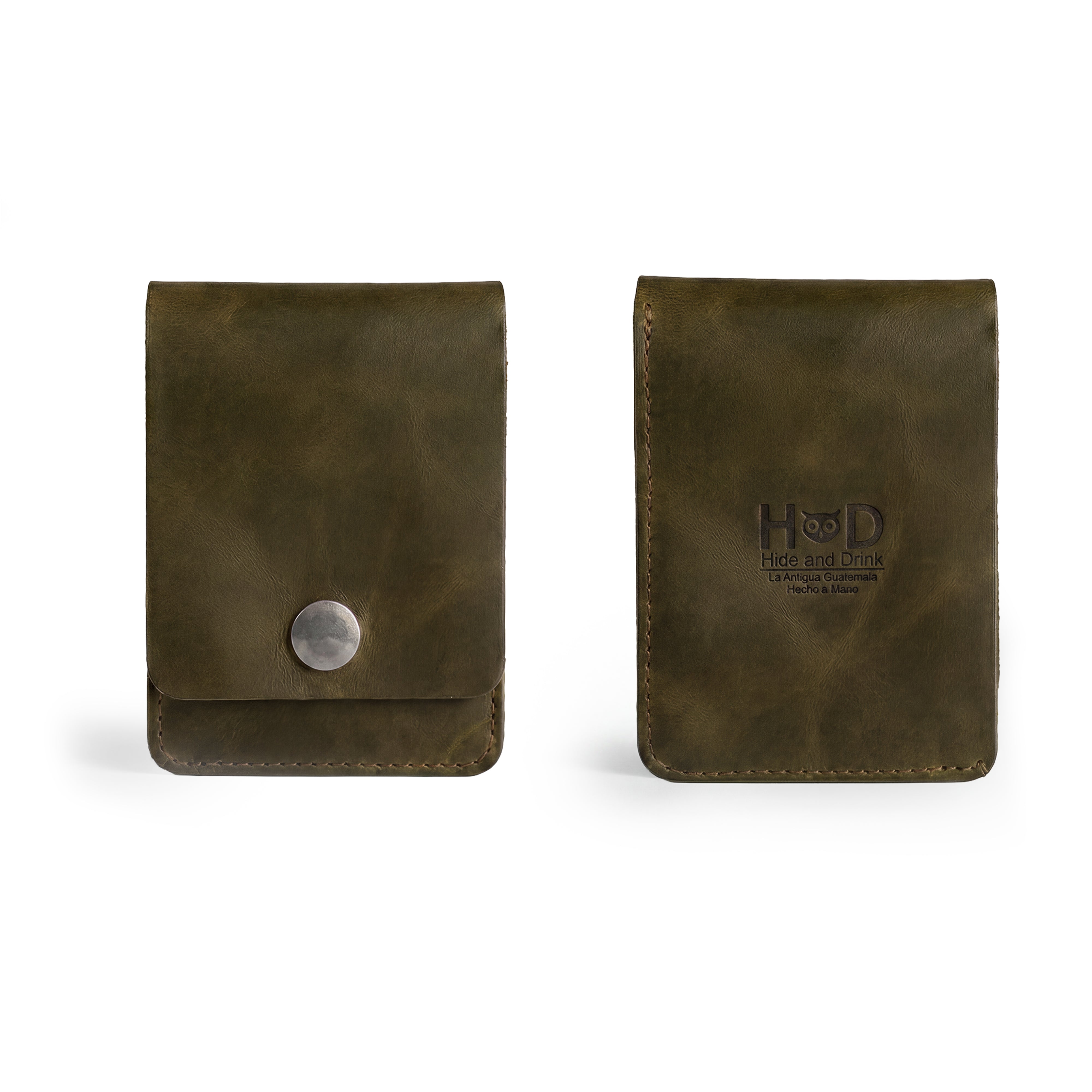 Opened green Vertical Wallet by Hide & Drink displaying card slots and cash compartment. This Vertical Front Pocket Wallet with Card Slot ensures compact storage for money and cards, crafted from full grain leather through small batch production methods with features like hand cut and hand sewn accents, fire branded by artisans. Handmade in La Antigua Guatemala & Oaxaca Mexico.
