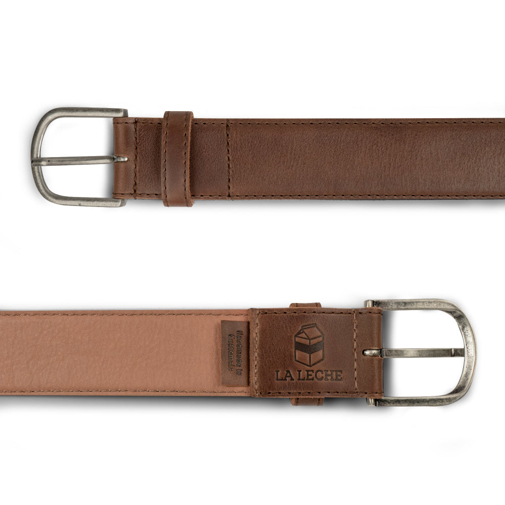 Classic Leather Belt with Glove Liner by La Leche displayed showing the dual side view of the belt and brand label. This full grain leather belt for men exemplifies handmade quality, featuring small batch production, hand cut and sewn techniques, and fire branded craftsmanship from La Antigua Guatemala & Oaxaca Mexico.