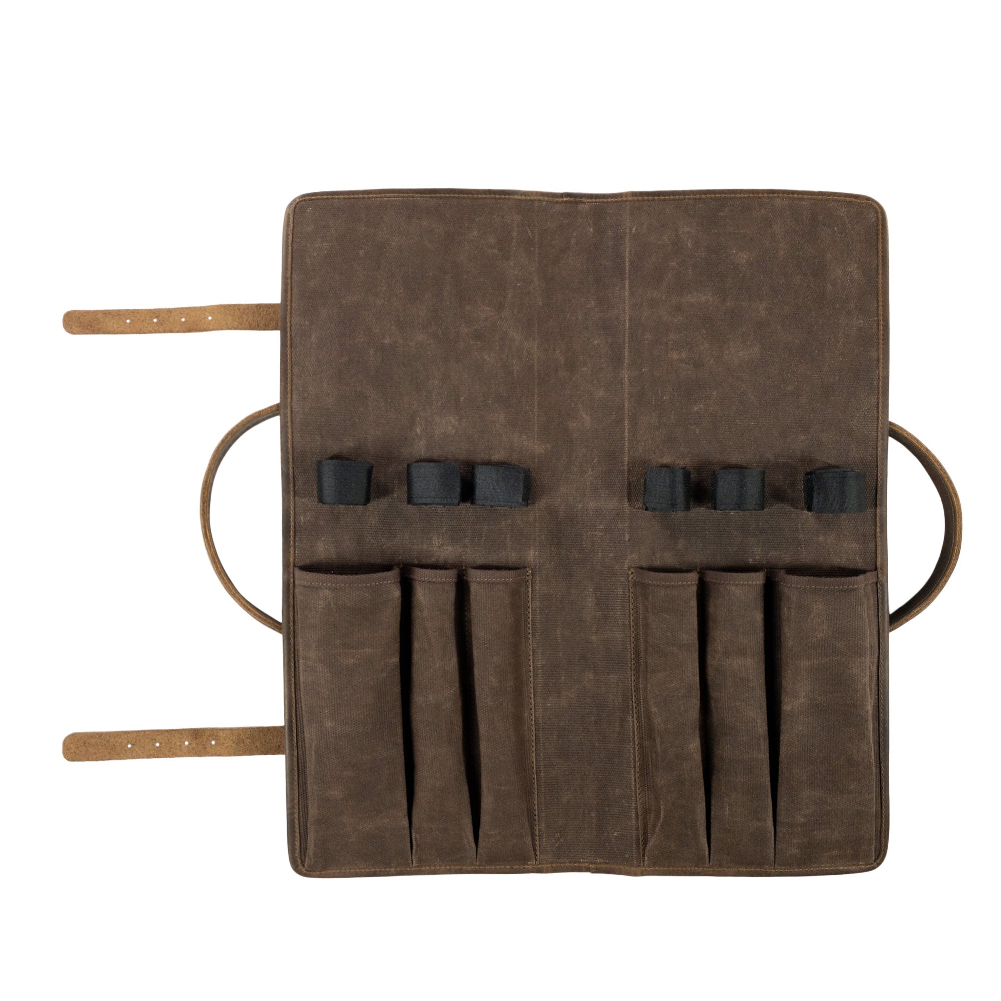 Open layout of Cast Leather Co. Grill Tool Holder (Tools NOT included), detailing the multifunctional compartments for grill tools. This rugged carry bag is crafted from full grain leather and waxed canvas, tailored for outdoor grill enthusiasts and camping needs. Handmade with care in La Antigua Guatemala and Oaxaca Mexico, showcasing artisan skill through small batch production.