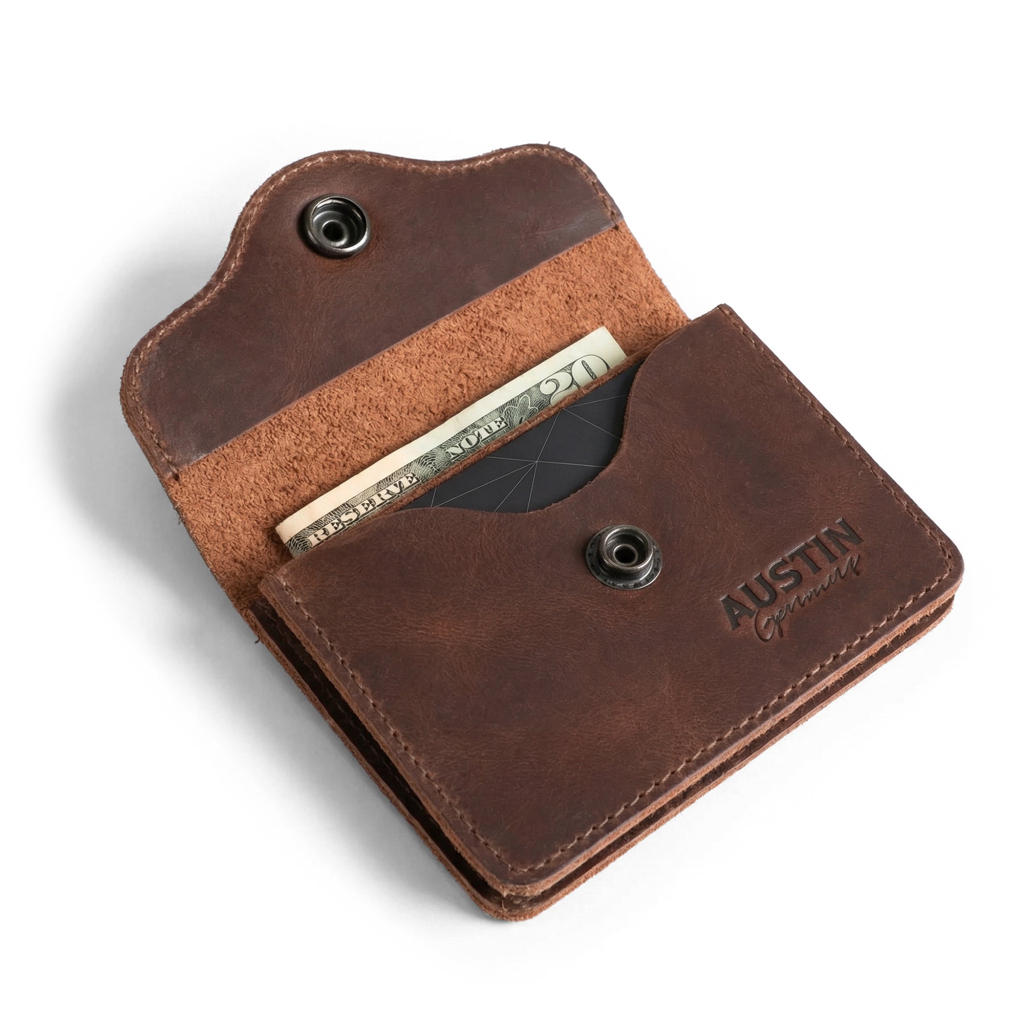The Hyde Card Wallet from Austin Genuine opened to reveal card and cash slots, crafted from full grain leather with fire branded detailing, showcasing handmade quality and small batch production.