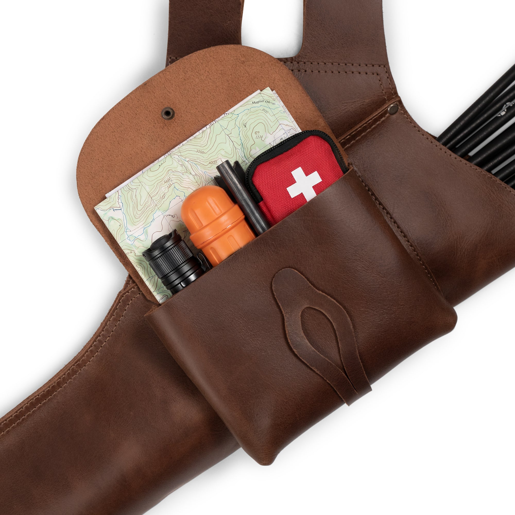 The Bowman, Hip Quiver by Valhalla Gear features a convenient extra pocket for storage, ideal for archery accessories. This leather arrow quiver is a vintage holder for recurve bow users, designed with usability in mind. Made from full grain leather, it embodies artisan craftsmanship with small batch production, hand cut, hand sewn finishes, and fire branded details, crafted in La Antigua Guatemala & Oaxaca Mexico.