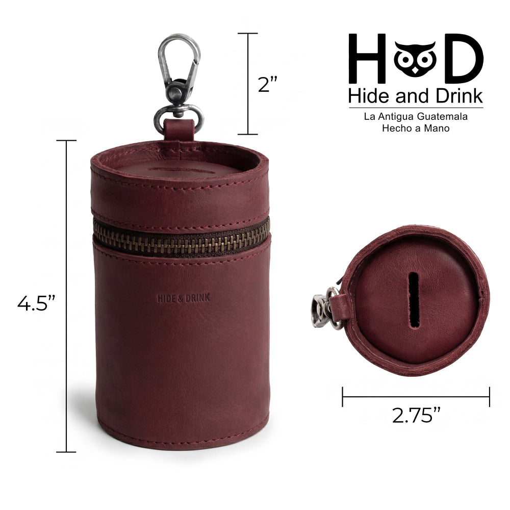 A detailed look at Hide & Drink's Bucket Coin Release, emphasizing its dimensions and sleek design. This artisan handmade cash organizer, lovingly cut and sewn, functions as a money box and coin case, reflecting quality craftsmanship from La Antigua Guatemala and Oaxaca Mexico.