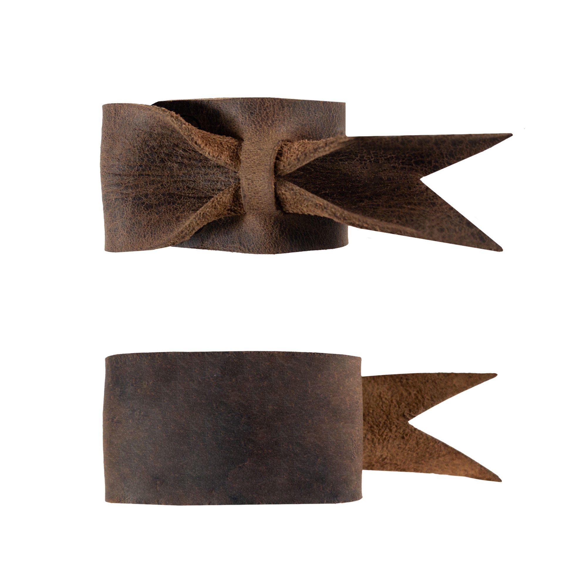 Refined Set of 4 Napkin Rings for Weddings by Hide & Groom, featuring a side view of leather napkin rings showcasing an elegant open bow style. Perfect for adding a decorative touch to wedding receptions and dinner parties, made from full grain leather with artisan handmade quality from La Antigua Guatemala & Oaxaca Mexico.