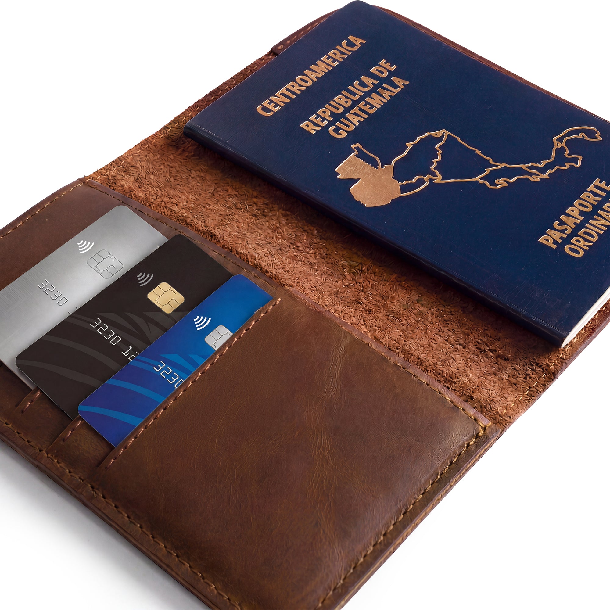 An open hide and drink Travel Wallet displaying the interior card slots and space for currency. This handmade classic wallet serves as a bifold passport case, crafted from full grain leather, perfect for travel accessories.