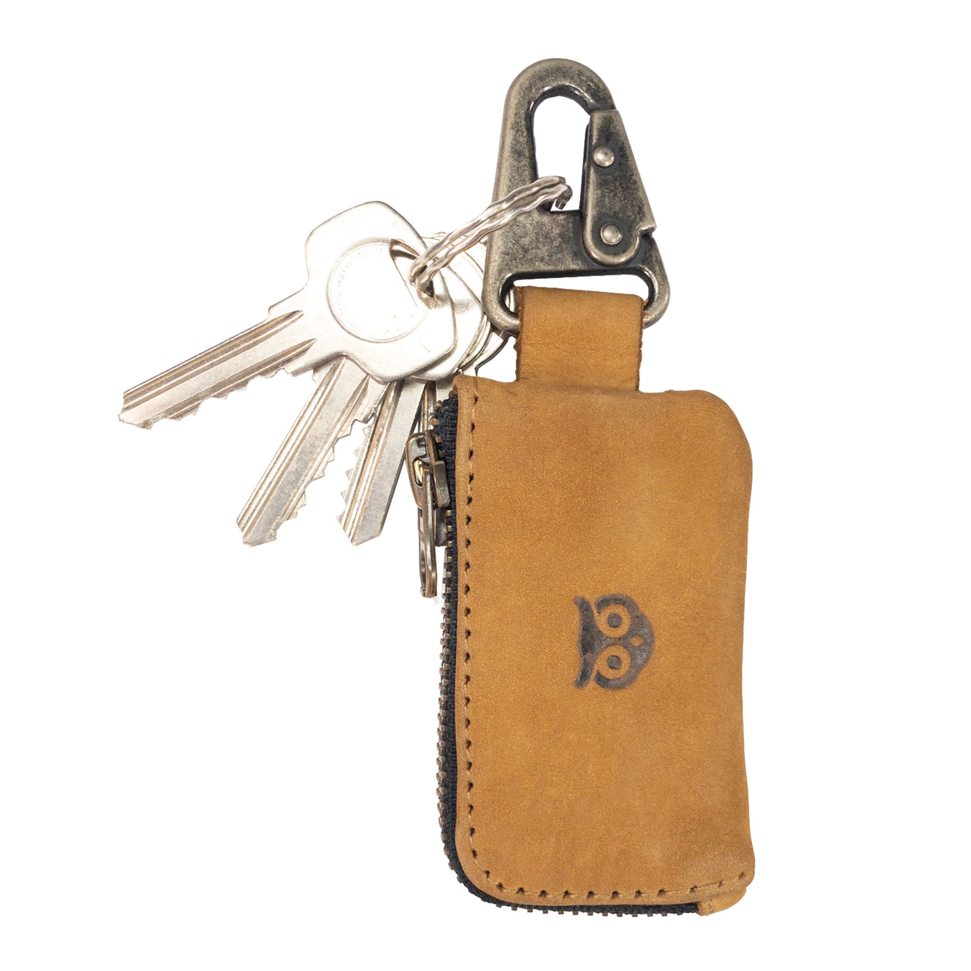 The Hide & Drink Car Key Holder showing its detailed design and nickel metal clasp, perfect for storing keys and cash. A practical accessory for headphones and flash drives, handmade in La Antigua Guatemala & Oaxaca Mexico.