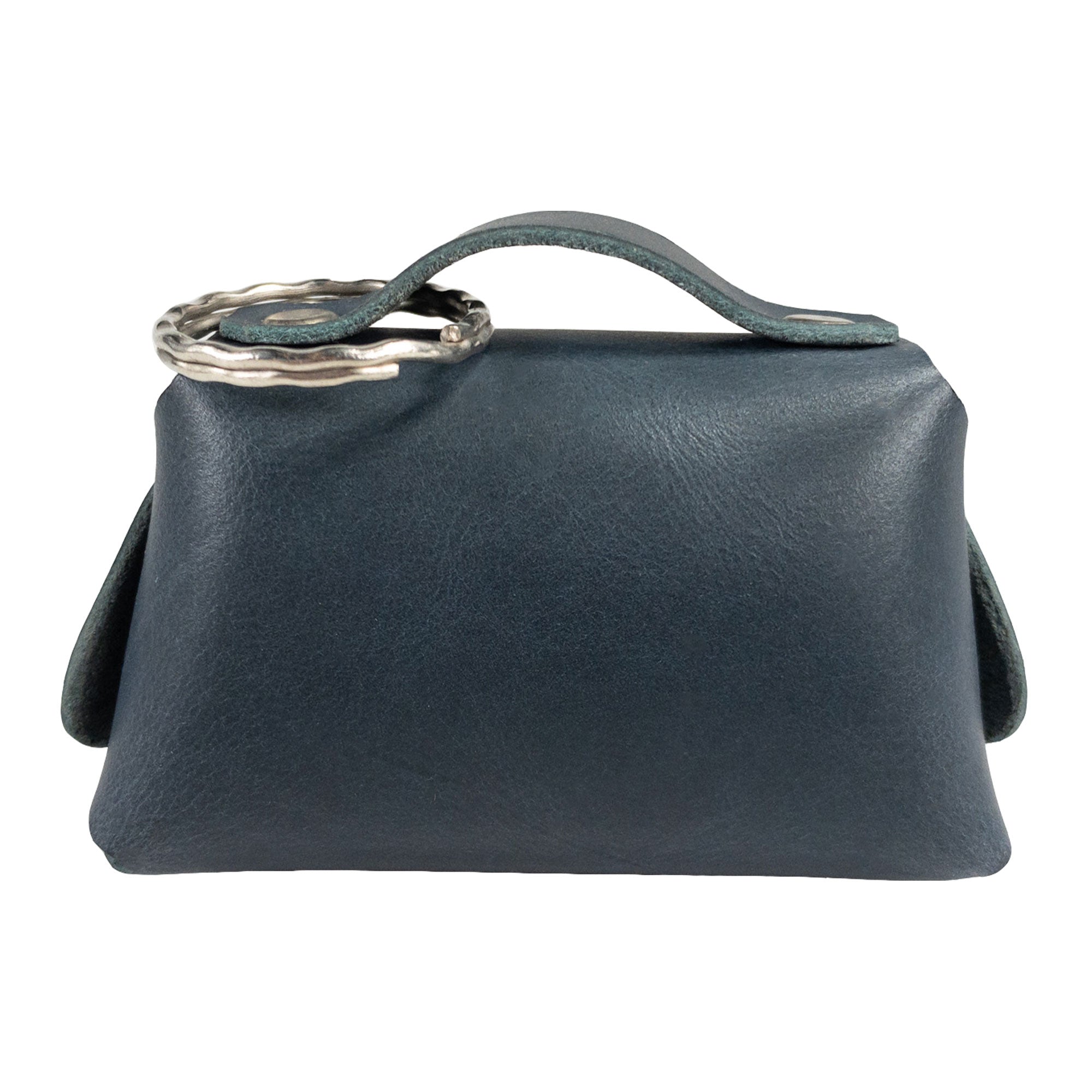Back view of the Tiny Handbag Keychain by Hide & Drink, emphasizing its chic look and practical design with a key ring holder. Made from high-quality Full Grain Leather, this artisan-crafted keychain showcases the beauty of small batch production in La Antigua Guatemala.