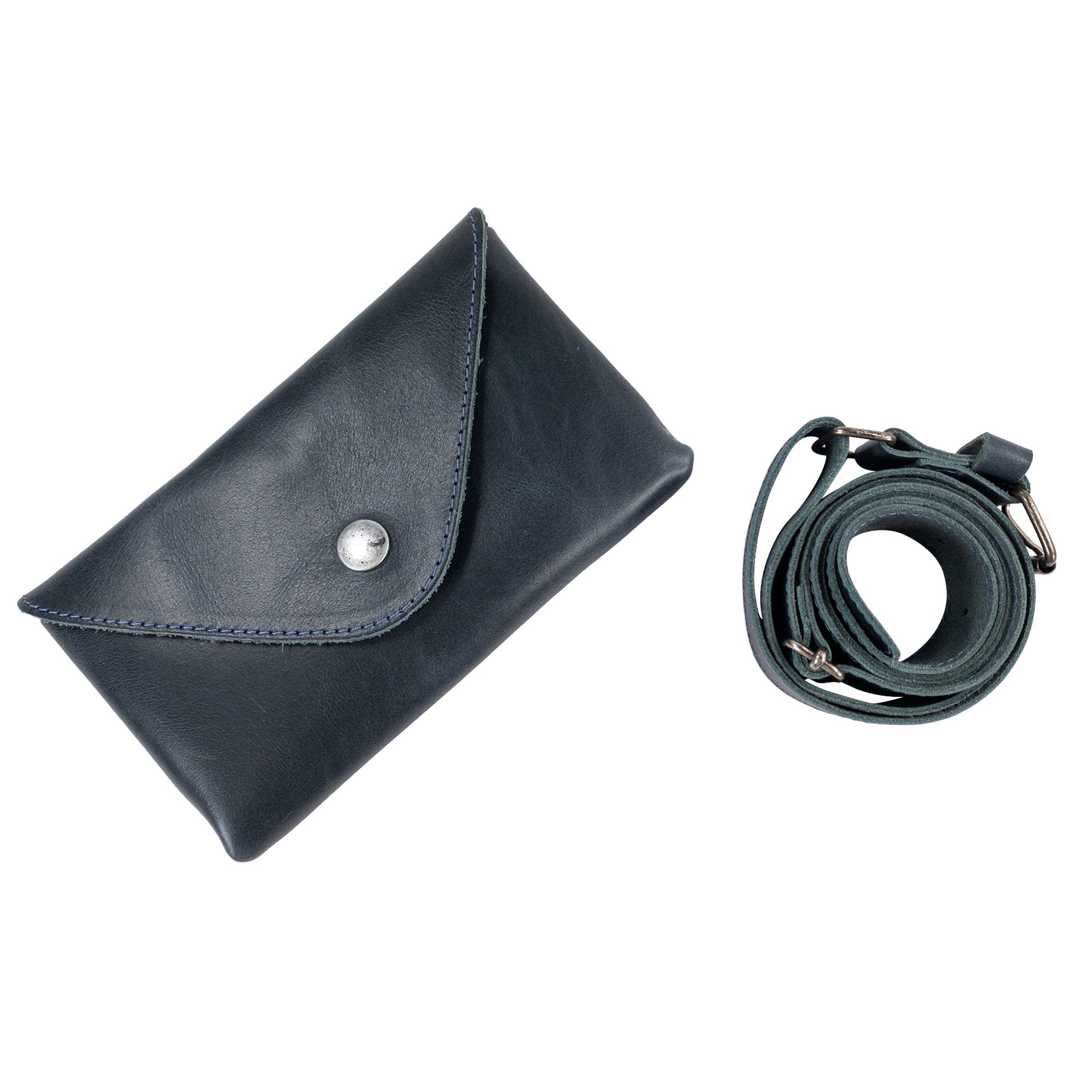Practical display of Hide & Drink's Fancy Fanny Pack in black leather. This artisan waist pouch is great for carrying essentials while traveling, and functions as a phone holder or vintage purse.