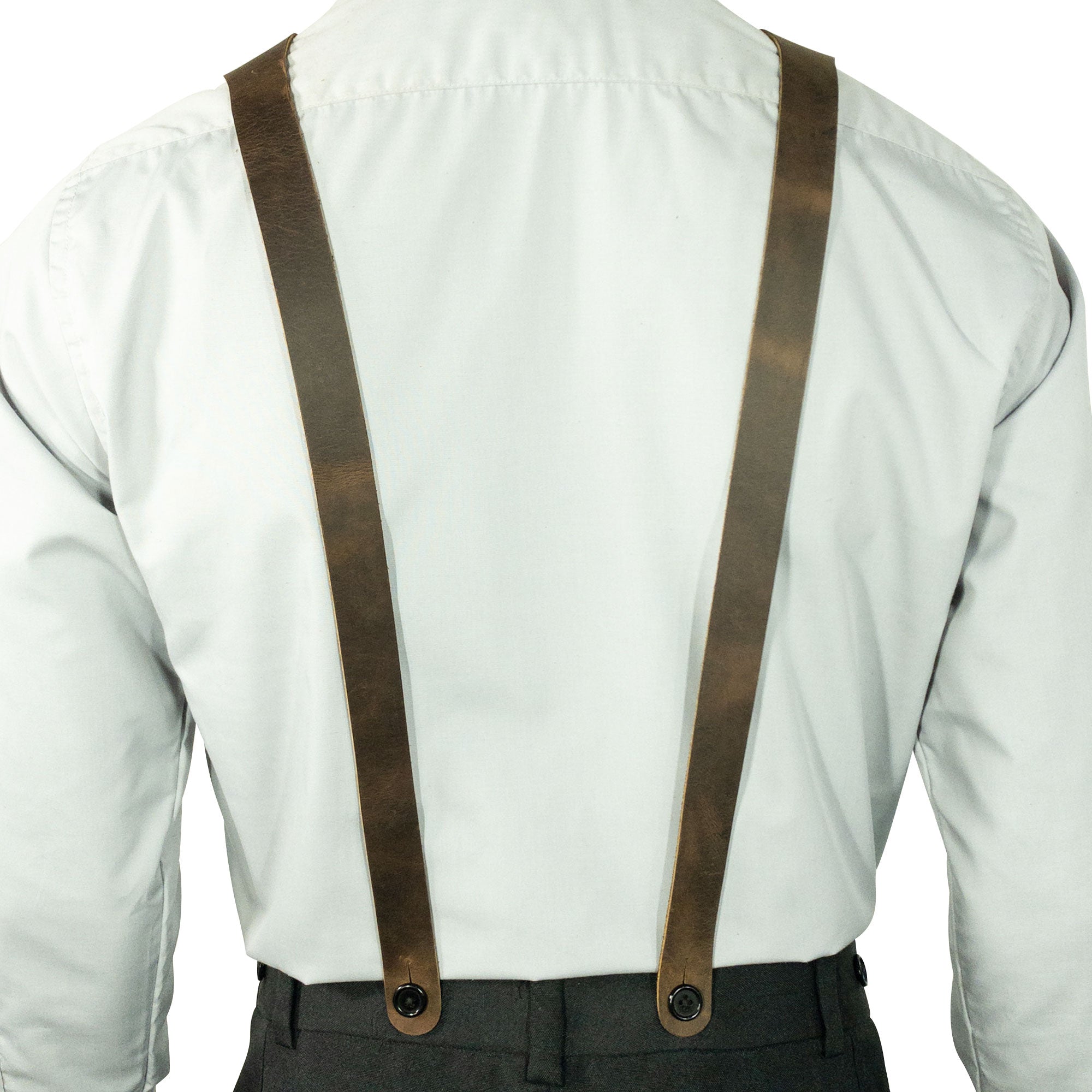 Button End Suspenders by Hide & Groom, seen from the back, designed for comfort and style. These full grain leather suspenders are ideal for weddings and dinner parties. Hand cut and hand sewn in La Antigua Guatemala for quality craftsmanship.