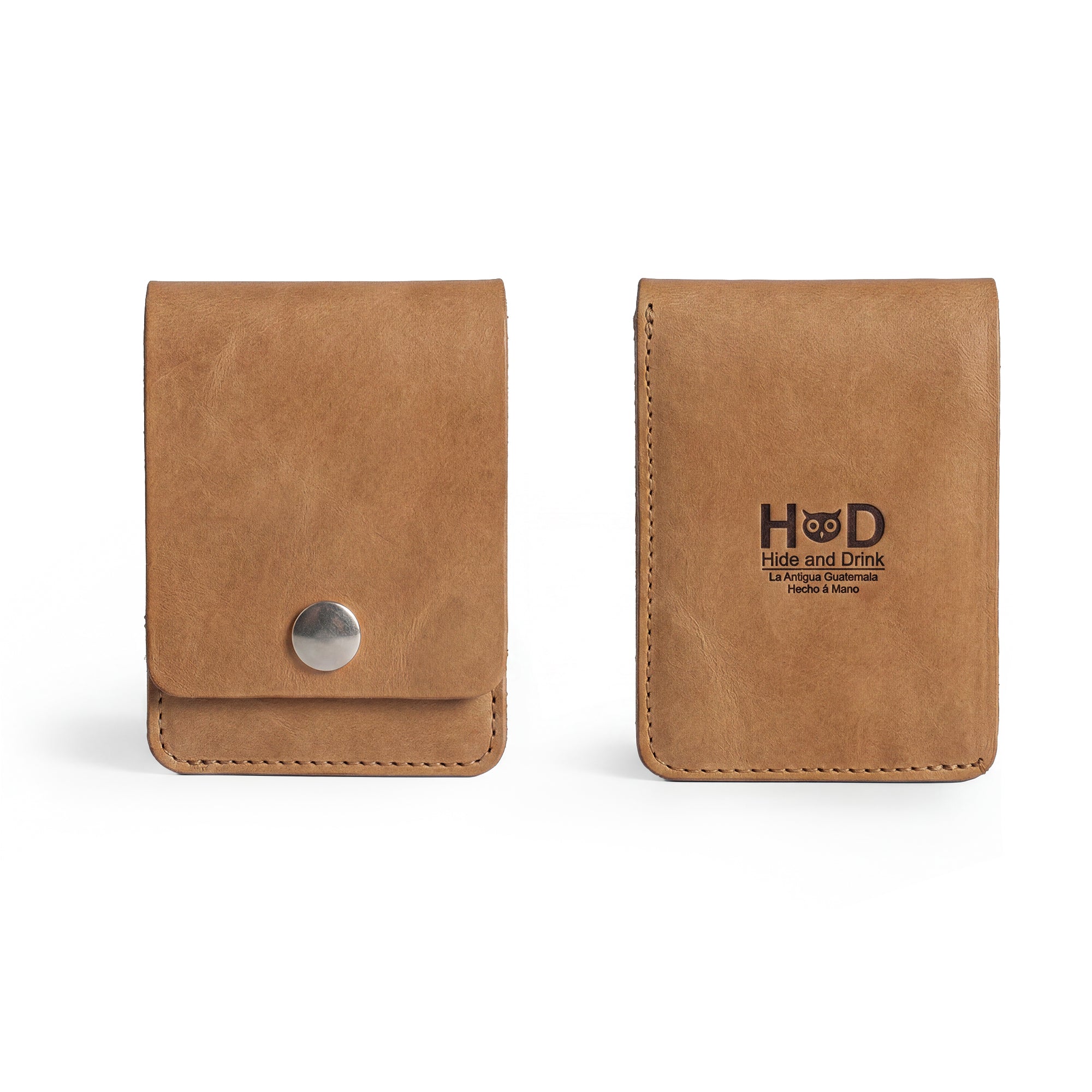 Front view of a brown variant of the Vertical Wallet by Hide & Drink, showcasing a simple snap closure. This Vertical Front Pocket Wallet with Card Slot provides compact storage for bills and cards, made from high-quality full grain leather reflecting small batch production methods, hand cut, hand sewn, and fire branded by craftsmen. Handmade in La Antigua Guatemala & Oaxaca Mexico.