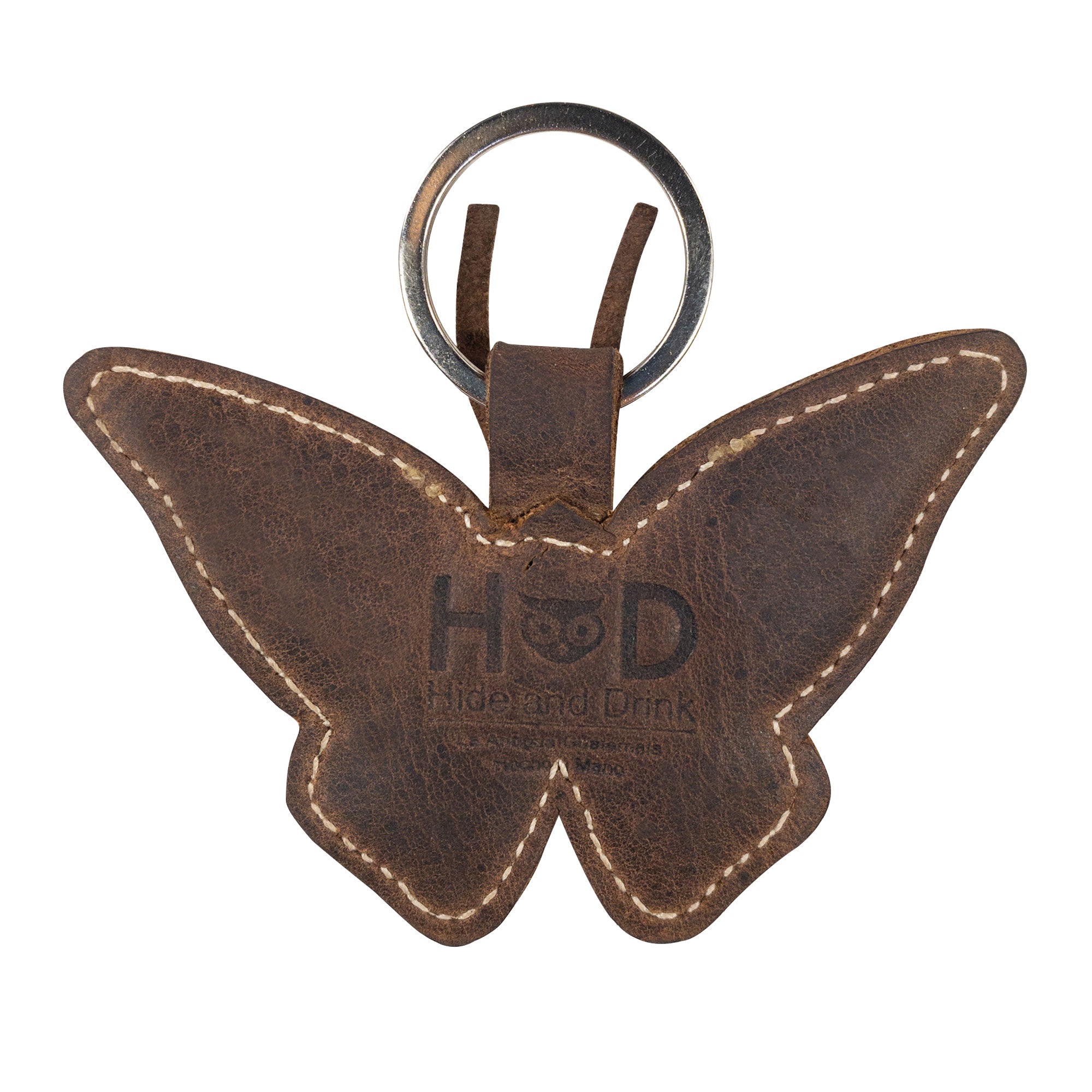 Back view of the Butterfly Keychain by Hide & Drink, revealing the intricate fire branded logo on quality full grain leather. This handmade key ring is a must-have for nature lovers who appreciate flying insects and artisan craftsmanship.