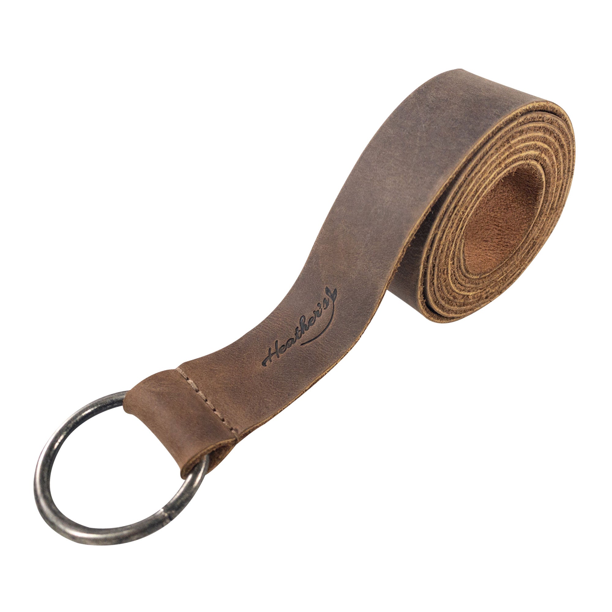 Another angle of Heather's Ring Belt for Women, emphasizing its full grain leather material and artisan quality. This unique no buckle waist belt is adjustable for comfort and style. Ring Belt for Women, No Buckle Waist Belt, Fashion, Adjustable, Full Grain Leather, Handmade Waist Accessory, Small Batch Production, Hand Cut, Hand Sewn, Fire Branded, Artisan, Handmade in La Antigua Guatemala & Oaxaca Mexico.