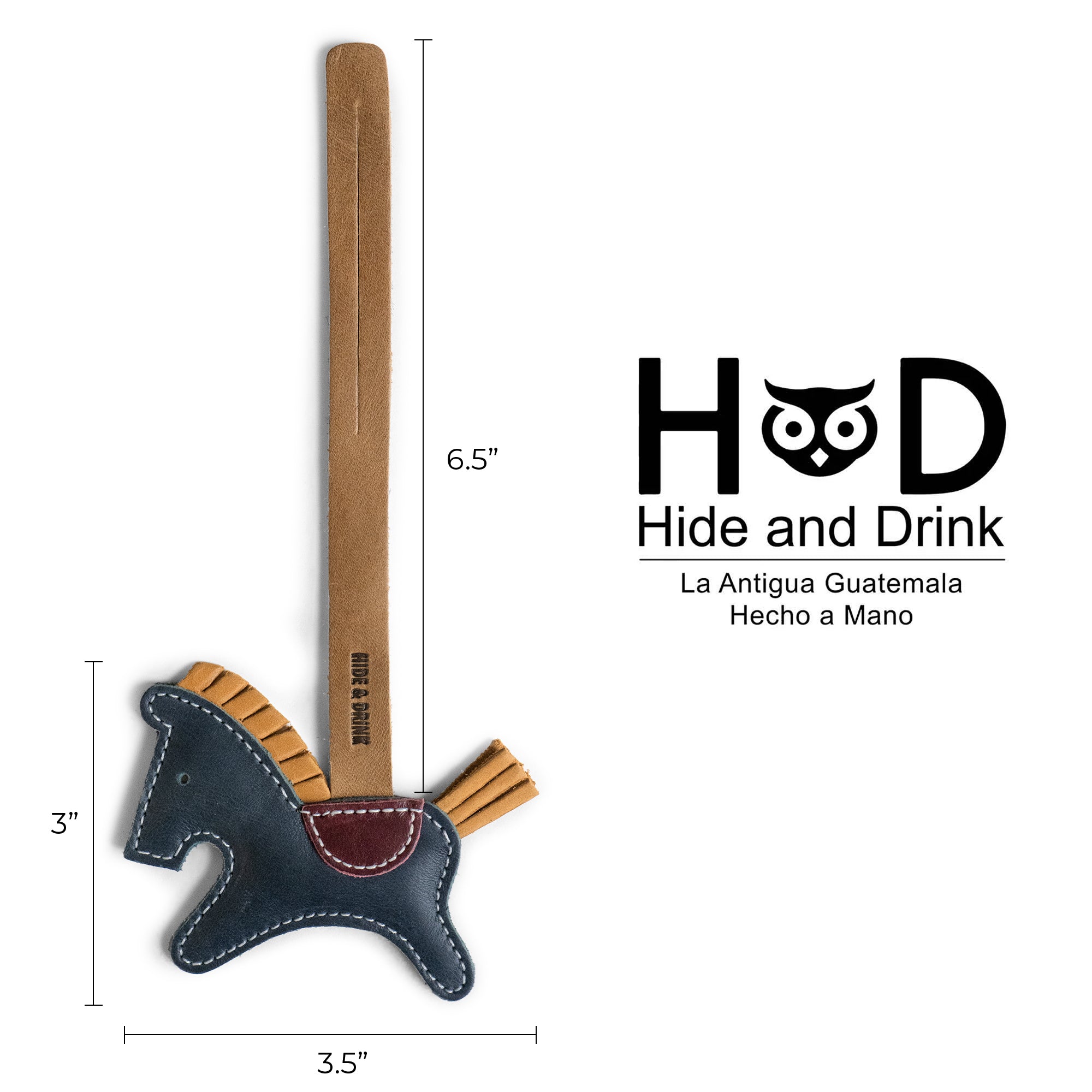 Detailed dimensions of the Hide & Drink Horse Bag Charm emphasizing its craftsmanship. This artisan charm, made of full grain leather, is perfect for handbags, purses, and backpacks. Handmade in La Antigua Guatemala, it features fire branded elements and showcases the quality of small batch production.