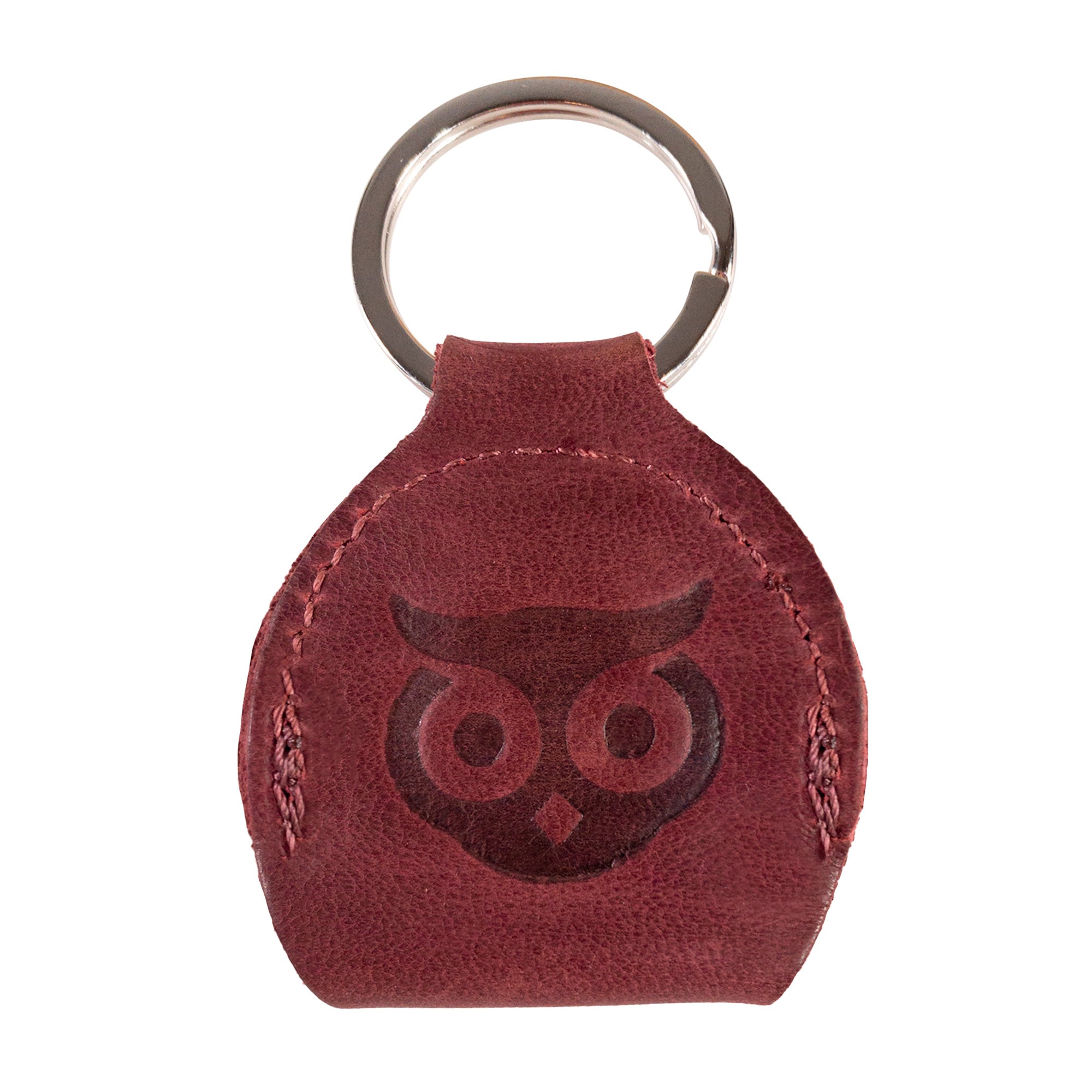 Back view of the Key Chain & Guitar Pick Holder by Hide & Drink illustrating its sturdy construction and design. This Guitar Pick Holder with Ring is a fantastic key organizer for guitar players, made from robust Full Grain Leather. Highlighting small batch production quality, it features Hand Cut and Hand Sewn artistry along with a fire branded logo, handmade in La Antigua Guatemala & Oaxaca Mexico.