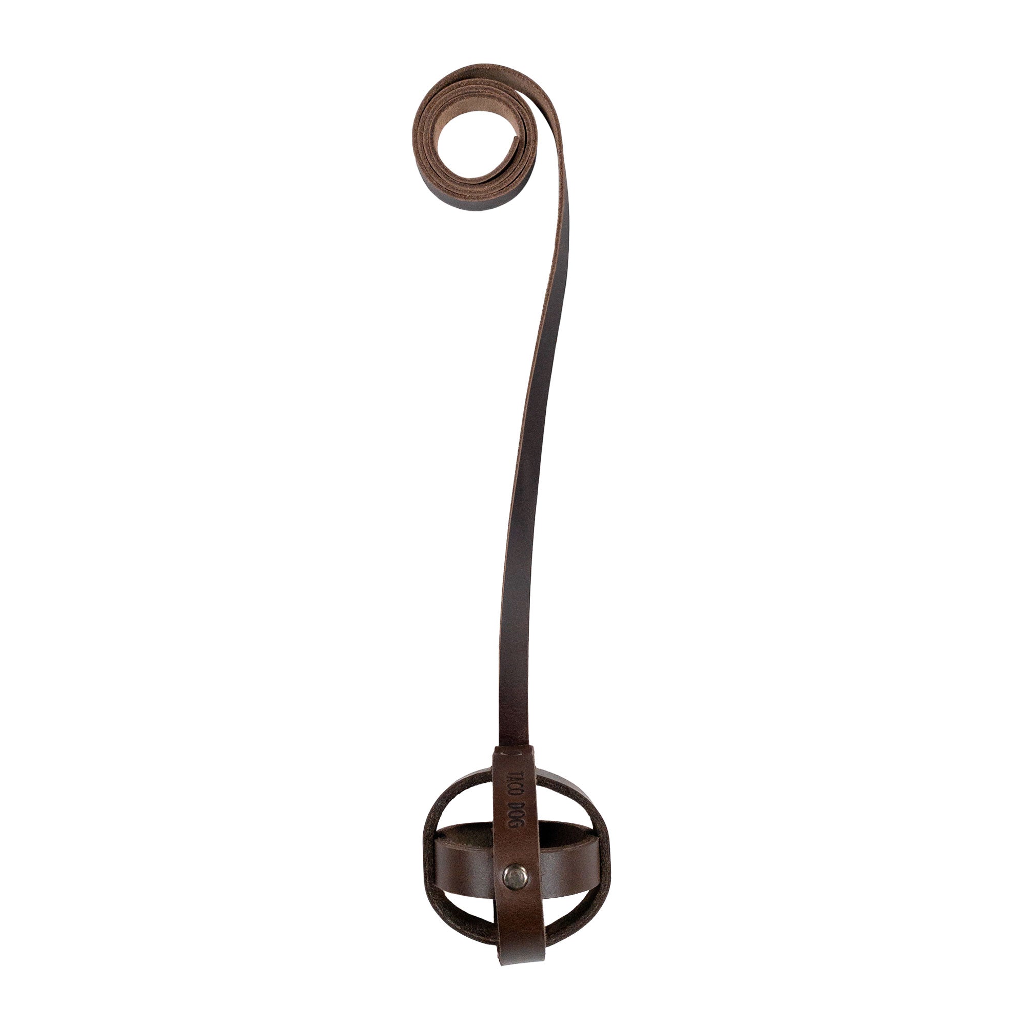 Top view of Taco Dog's Ball Toy with Strap for Cats showcasing its unique design. This handmade chasing pet toy, crafted from full grain leather, is perfect for keeping cats entertained indoors. Artisan-made in La Antigua Guatemala for quality playtime.