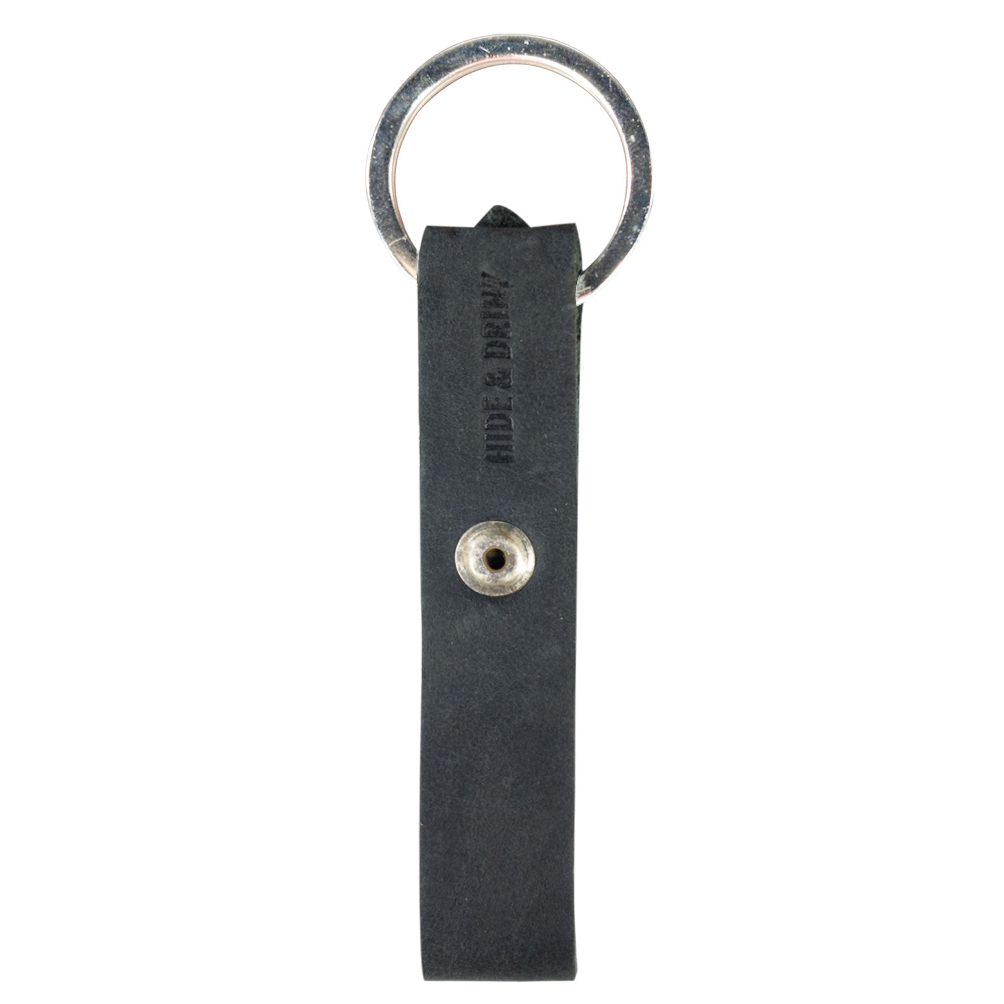 Hide & Drink Loop Keychain showcasing a functional yet stylish black strap design. This artisan-crafted keyring organizer is made from full grain leather, reflecting the quality and care of small batch production in La Antigua Guatemala & Oaxaca Mexico.