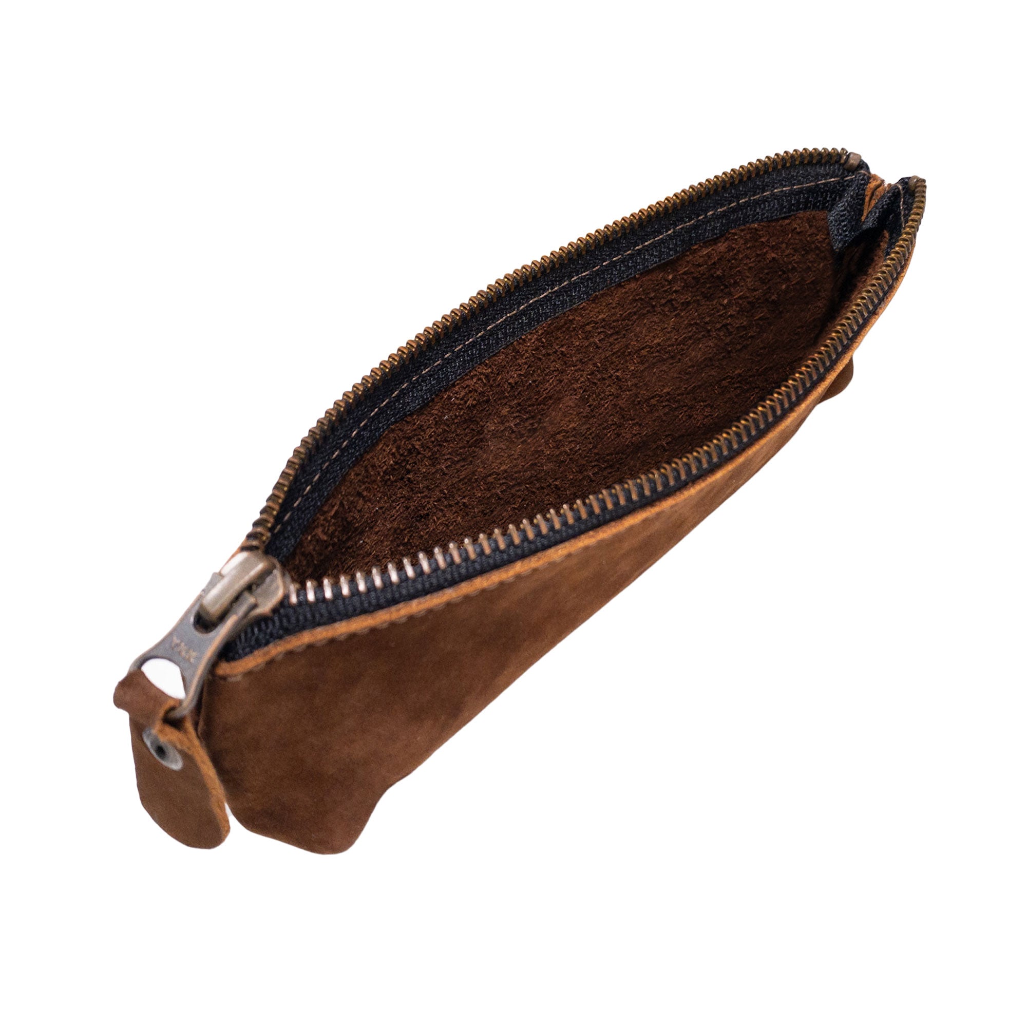 Interior view of Hide & Drink's Pencil Pouch revealing its flat zippered holder. This rectangular pencil case in full grain leather is ideal as a pen & marker pouch for both men and women, combining practicality and style. Artisan-crafted in La Antigua Guatemala & Oaxaca Mexico, highlighting small batch production.