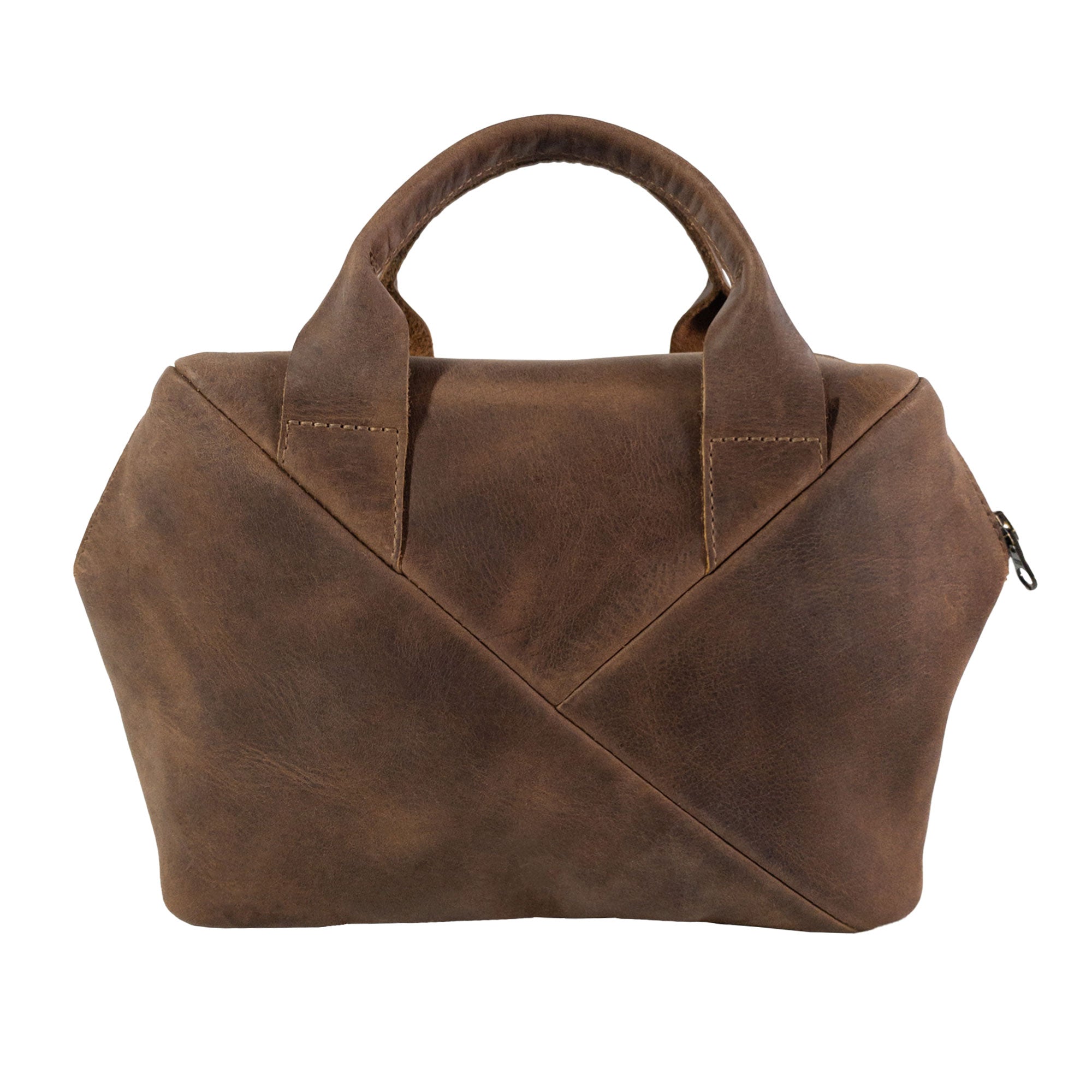 Stylish back view of Heather's Fluffy Purse showcasing its unique Full Grain Leather texture. As a Leather Fluffy Purse, it doubles as an efficient Handbag for Women and a trendy Night Bag, along with being a Rectangular Purse with Zipper. This bag features exquisite craftsmanship from Small Batch Production with Hand Cut and Hand Sewn details, Fire Branded, and proudly Handmade in La Antigua Guatemala & Oaxaca Mexico.
