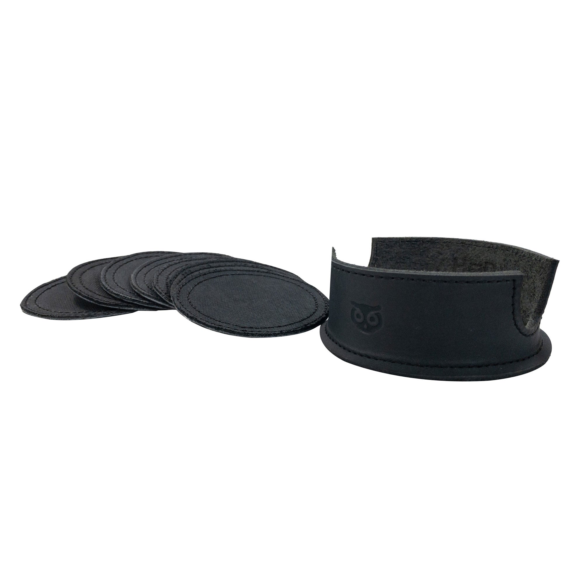 Image showcasing the coasters and leather holder from the Set of 8 Circular Coasters for Drinks by Hide & Drink. These coasters are perfect for Glass & Cups Stain Protection and are made from high-quality Waxed Canvas and Full Grain Leather. StockyardX emphasizes Small Batch Production with these Hand Cut, Hand Sewn, Fire Branded items, crafted Artisan, Handmade in La Antigua Guatemala & Oaxaca Mexico.