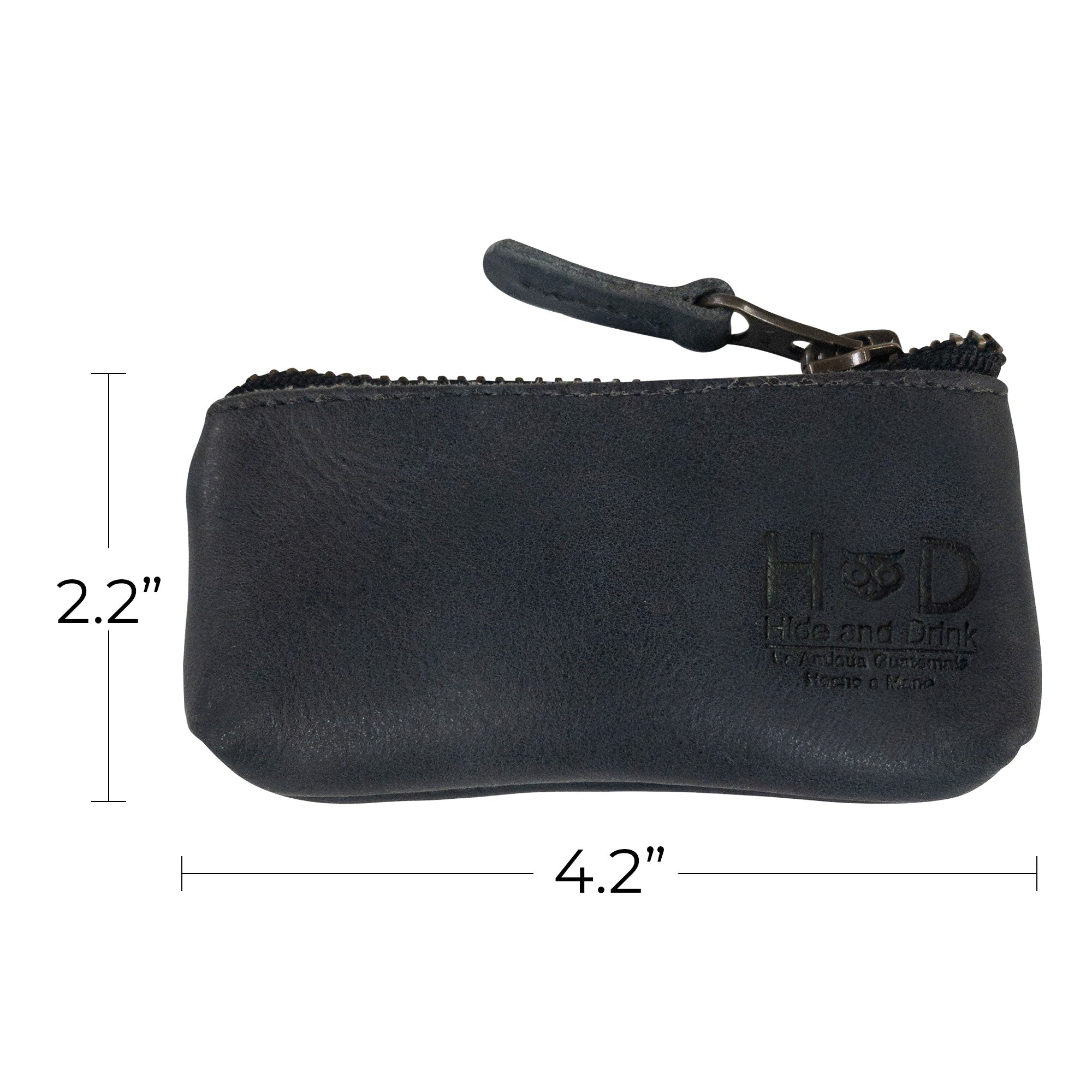 Hide & Drink Key Holder Zippered Pouch showcasing its artisan craftsmanship with attention to detail. Perfect for organizing keys, coins, or charging cables in a vintage style leather.