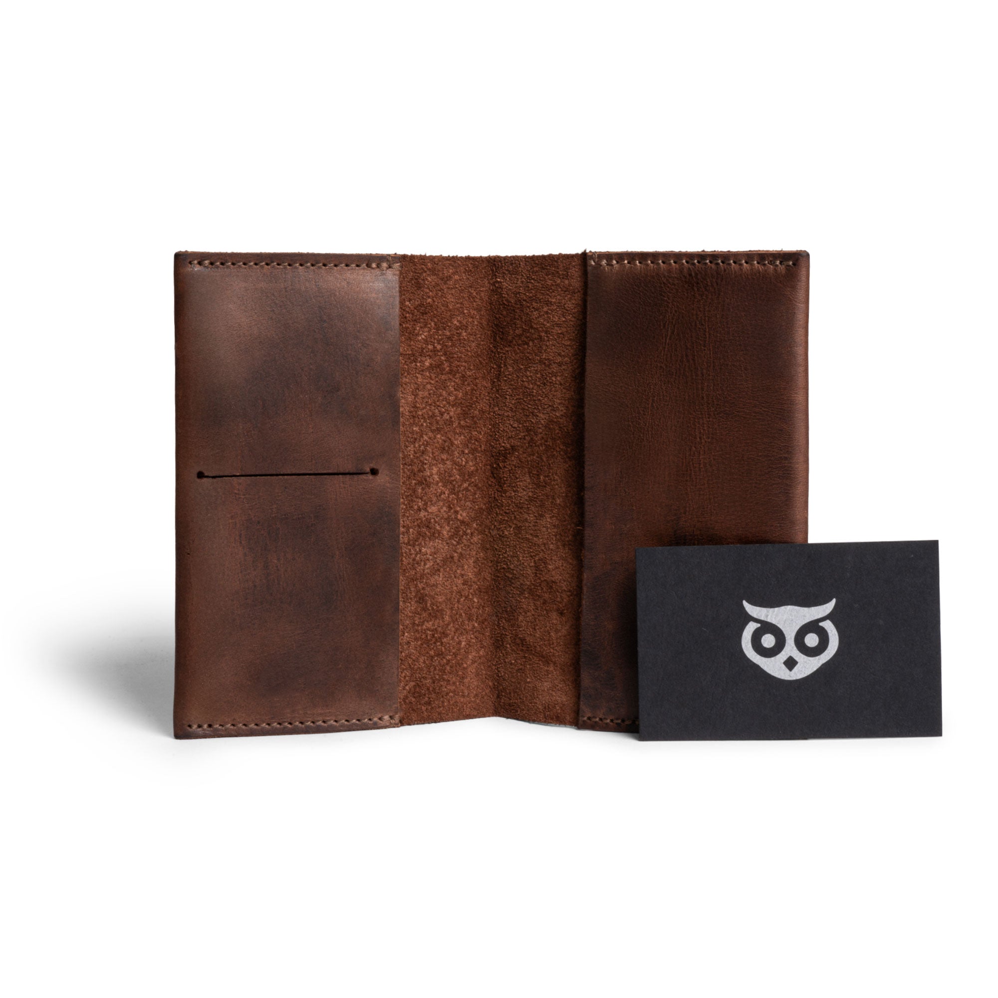 Elegant view of Hide & Drink’s Passport Case With Card Holder in a rich leather tone, designed to securely hold cards and a passport. This artisan-crafted travel essential features high-quality full grain leather, showcasing the intricacies of small batch production, handmade in La Antigua Guatemala & Oaxaca Mexico.