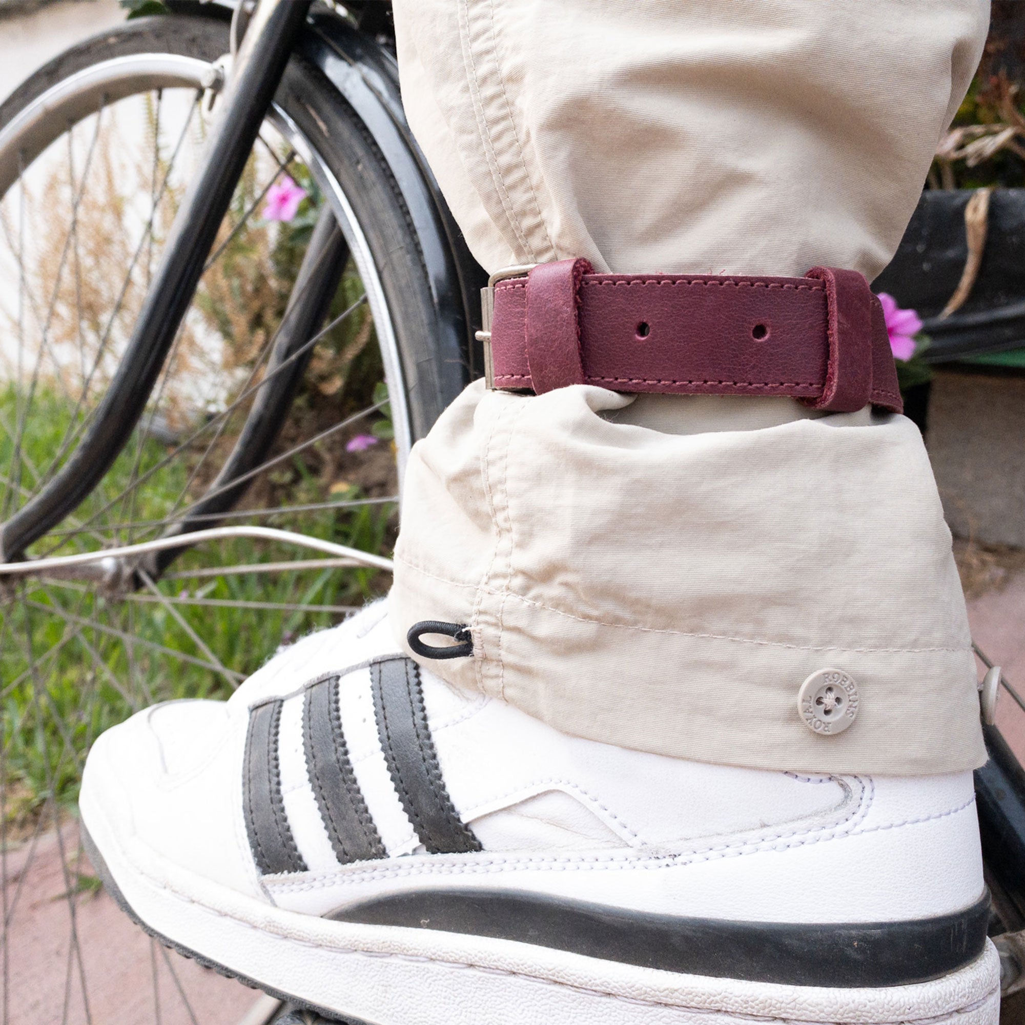 Bicycle Ankle Bands by Hide & Drink, showcasing a stylish pair of Rustic Bicycle Ankle Bands with a solid Brass Metal Buckle. These Adjustable Straps for Legs made from high-quality Full Grain Leather make exceptional Vintage Gifts for Cyclists, artisanally produced in La Antigua Guatemala.