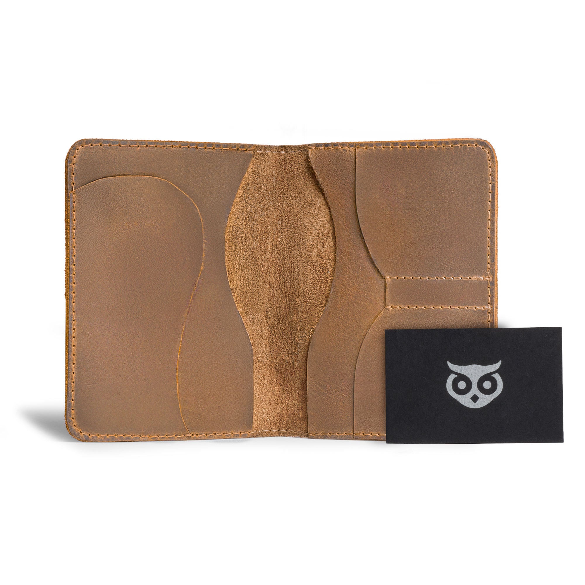Front view of the tan leather Hide & Drink Double Passport Wallet W/Key Slot with attached keychain, showcasing its functionality and rustic style crafted from full grain