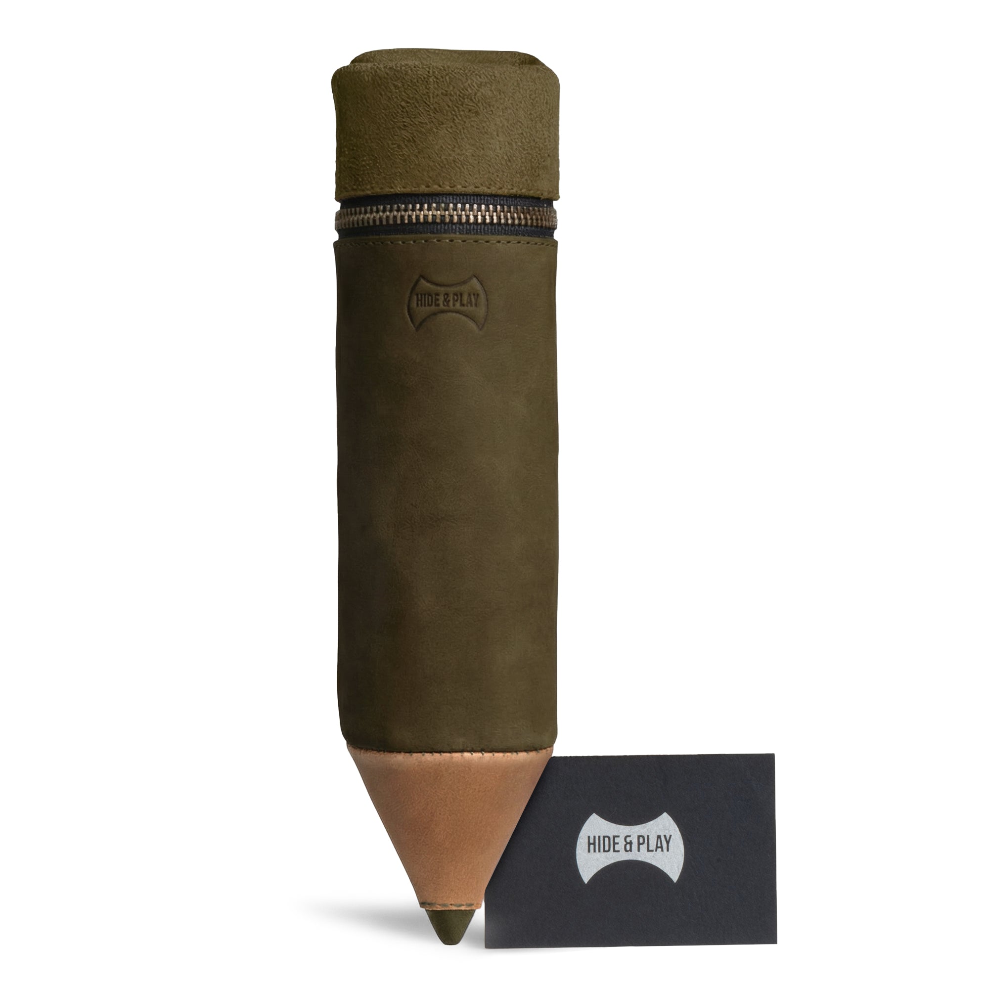 The Hide & Play Pencil-Shaped Case displayed alongside a brand tag, emphasizing its unique design for pens, pencils, and markers. Made from durable full grain leather, this handmade zippered bag is an artisan piece crafted in La Antigua Guatemala & Oaxaca Mexico, perfect for stylish office organization.