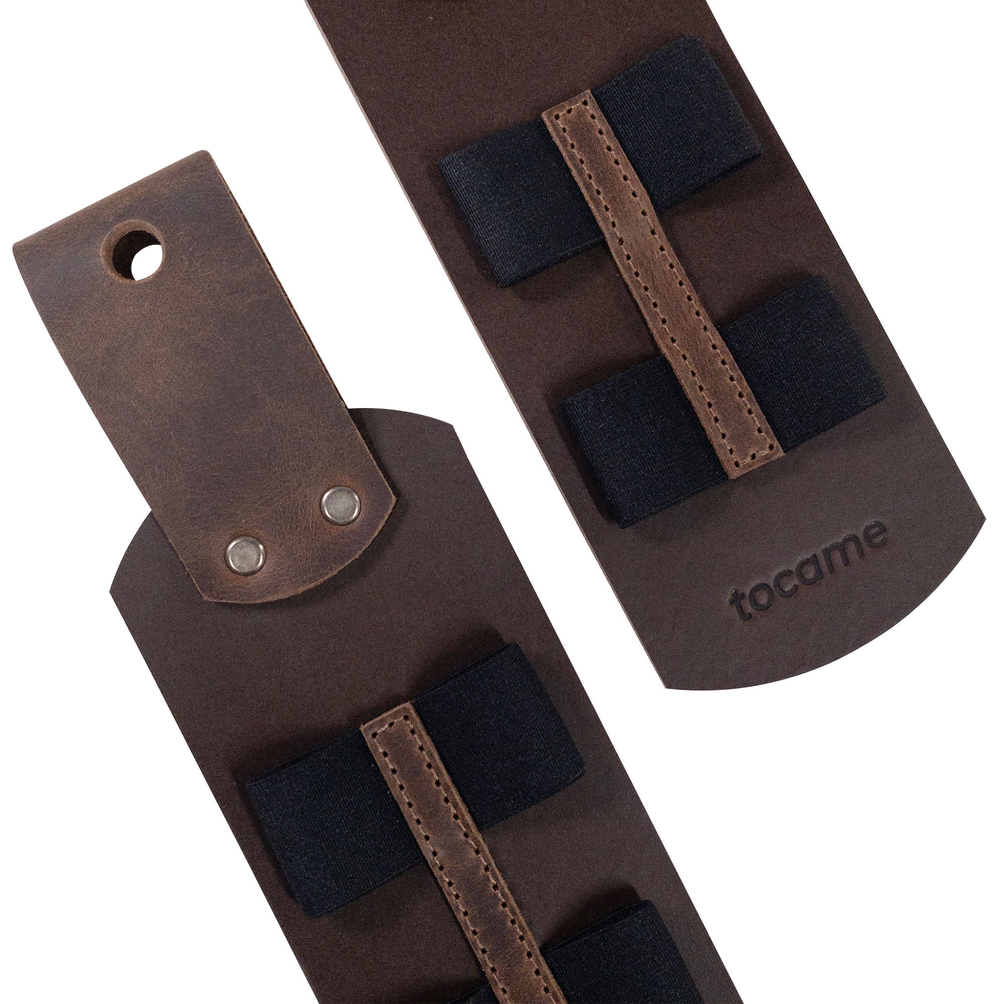 Detailed image of the Set of 2 Drum Stick Sleeves by tocame, showcasing the premium full grain leather and design elements that reflect artisanal quality. These handmade drum stick holders are fire branded for durability, crafted by local artisans in La Antigua, Guatemala, making them an excellent gift for drummers.