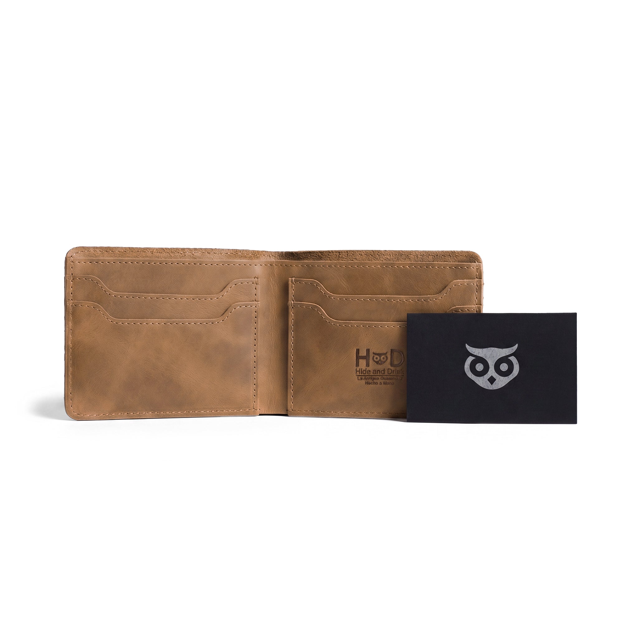 Elegant dark brown Classic Wallet by Hide & Drink, emphasizing its design and quality. This Classic Bifold Wallet, made from Full Grain Leather, serves as a functional storage case for identification. Perfect as a travel accessory, it highlights artisan skills through small batch production, hand cut and sewn in La Antigua Guatemala & Oaxaca Mexico.