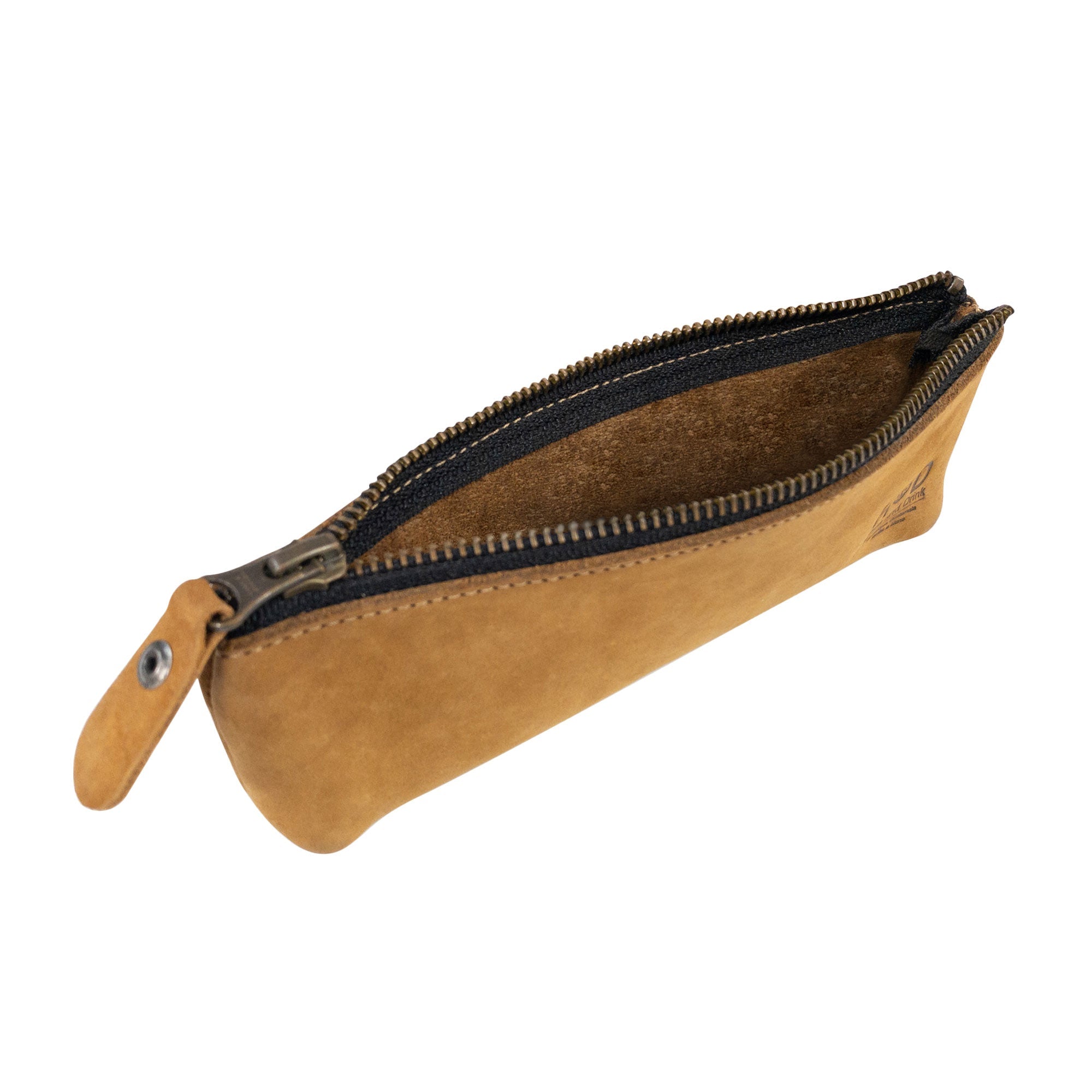 Stylish Pencil Pouch by Hide & Drink resting next to pens on a blue background. This rectangular pencil case is made of full grain leather, functioning as a pen and marker pouch perfect for both men and women. Hand cut and fire branded by artisans in La Antigua Guatemala.
