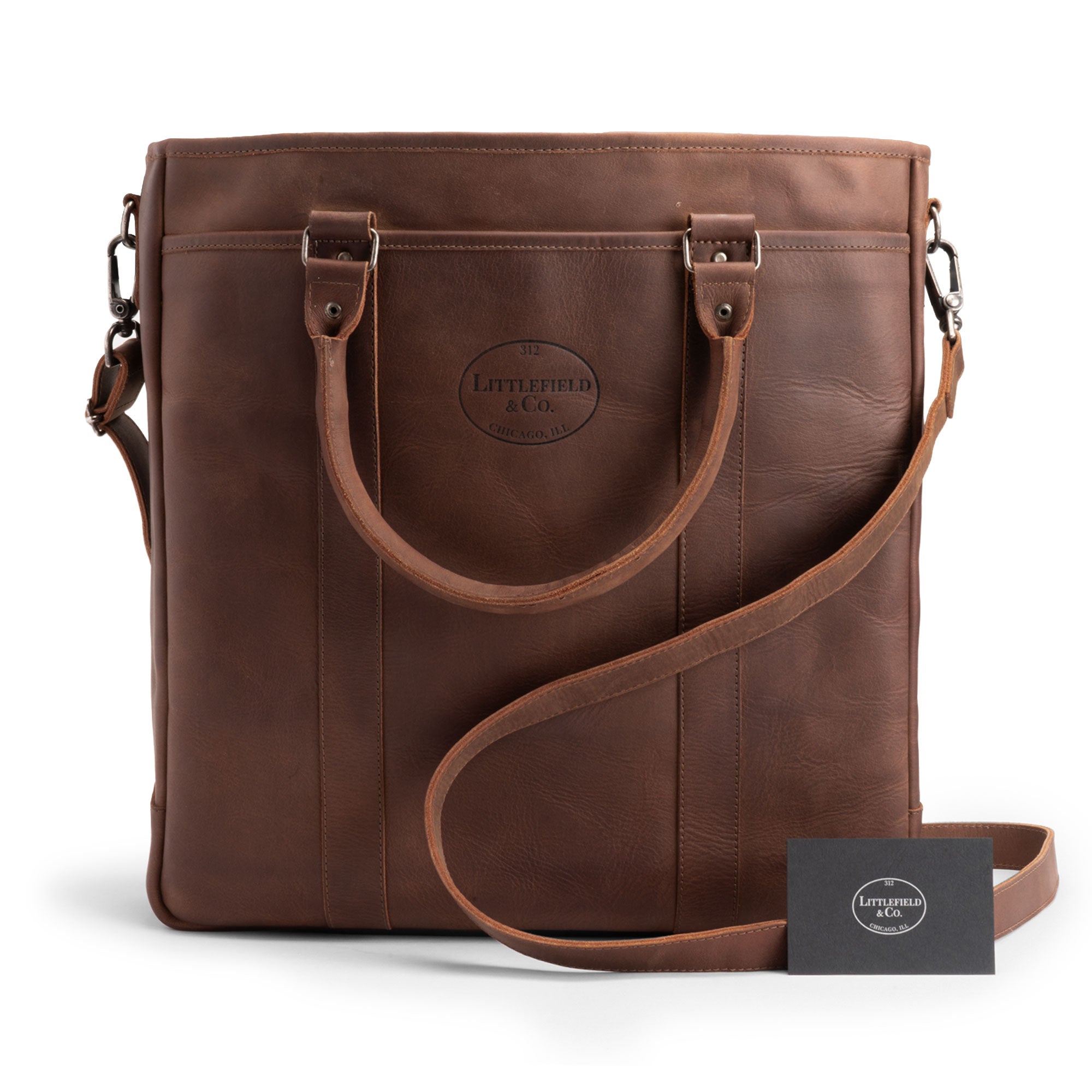 Front view of Littlefield & Co. Vintage Tote Vertical Briefcase & Laptop Carrier, showcasing its elegant design in full grain leather. This easy access bag is ideal for work and travel, emphasizing small batch production and artisan craftsmanship, handmade in La Antigua Guatemala.