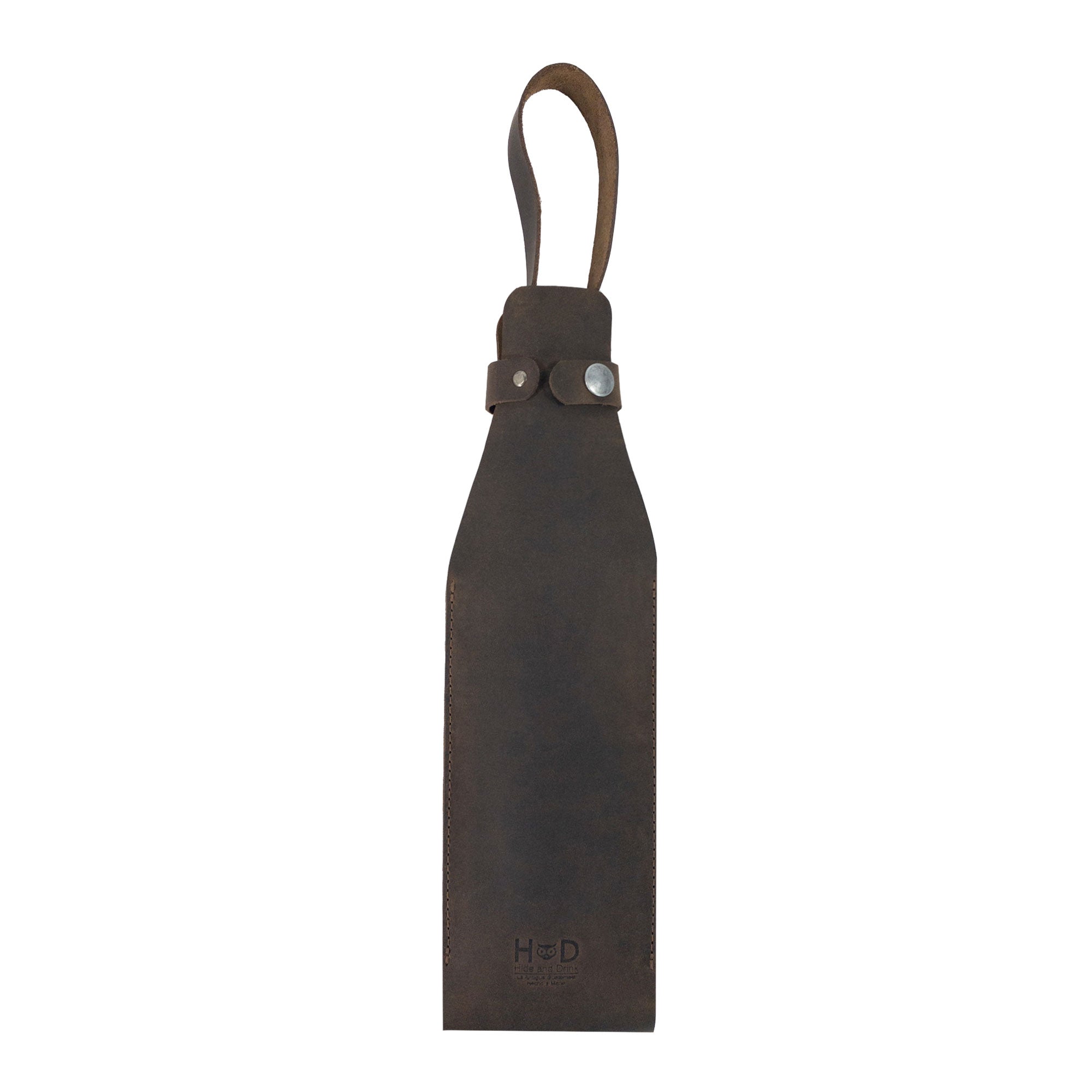 The exterior of Hide & Drink's Single Bottle Wine Carrier made of sturdy Full Grain Leather, revealing its sleek silhouette. As a product of Small Batch Production, each Single Bottle Wine Carrier is hand cut and hand sewn by artisans in La Antigua Guatemala & Oaxaca Mexico.
