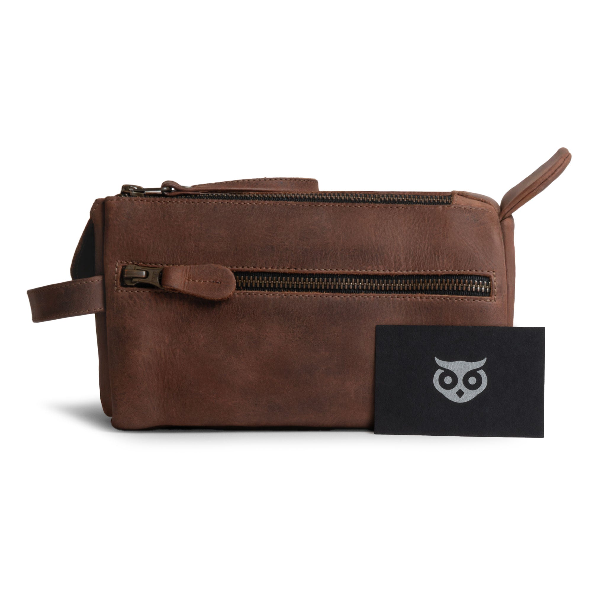 Hide & Drink's Toiletry Bag with a personal touch, showing a care card. This Full Grain Leather Toiletry Bag is a stylish Hand Bag and Dopp Kit Organizer for travel. StockyardX, Handmade, S.