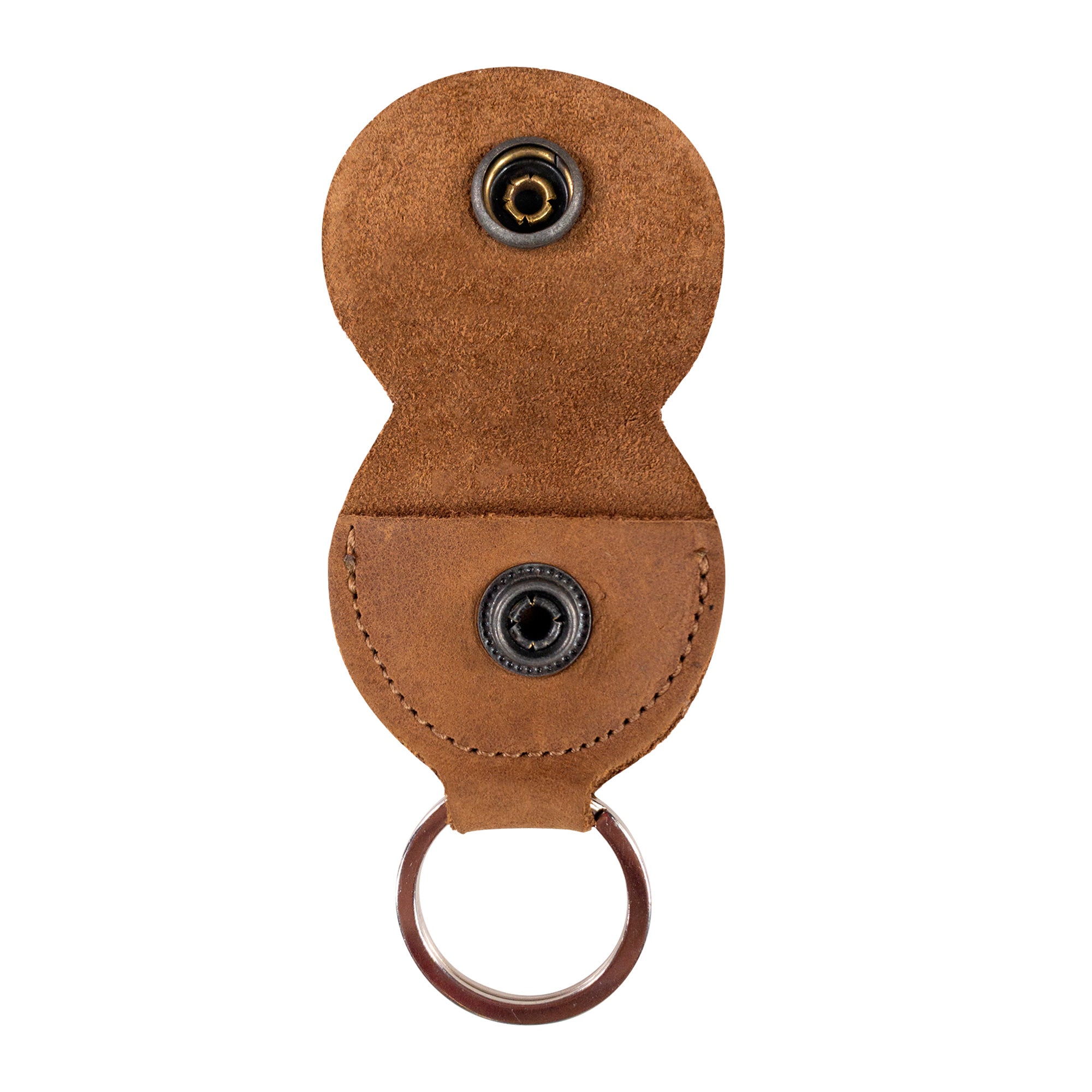 An overview of the Key Chain & Guitar Pick Holder by Hide & Drink, showing its unique shape and leather quality. This Guitar Pick Holder with Ring functions as a handy key organizer, especially for guitar enthusiasts. Constructed from Full Grain Leather, it embodies StockyardX's commitment to small batch production. Hand cut, hand sewn, and fire branded, this artisan item is handmade in La Antigua Guatemala & Oaxaca Mexico.