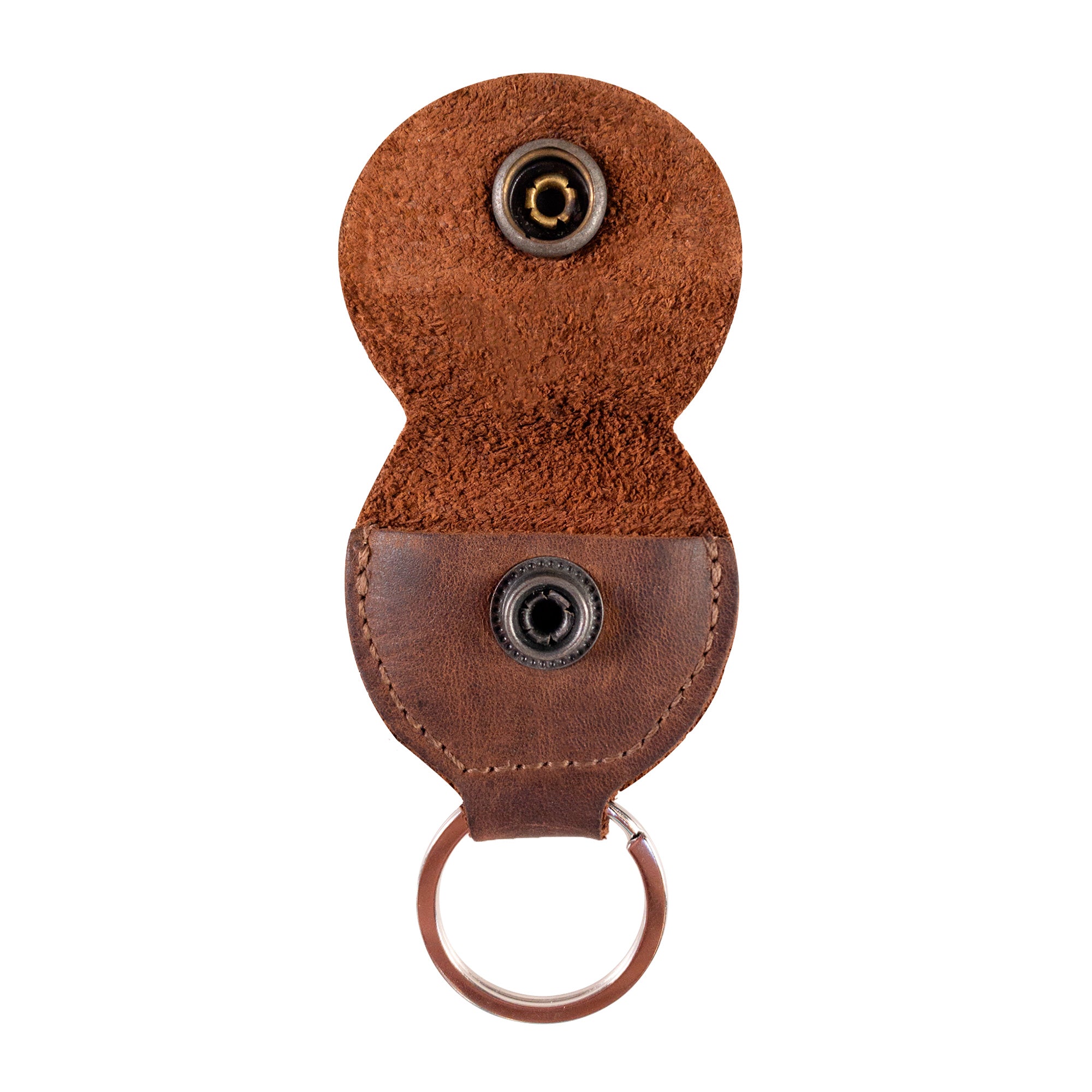 A detailed view of the Key Chain & Guitar Pick Holder by Hide & Drink, focusing on its practical design as a Guitar Pick Holder with Ring. This key organizer is made from Full Grain Leather, underlining its artisan quality through small batch production and hand cut, hand sewn methods, created in La Antigua Guatemala & Oaxaca Mexico.