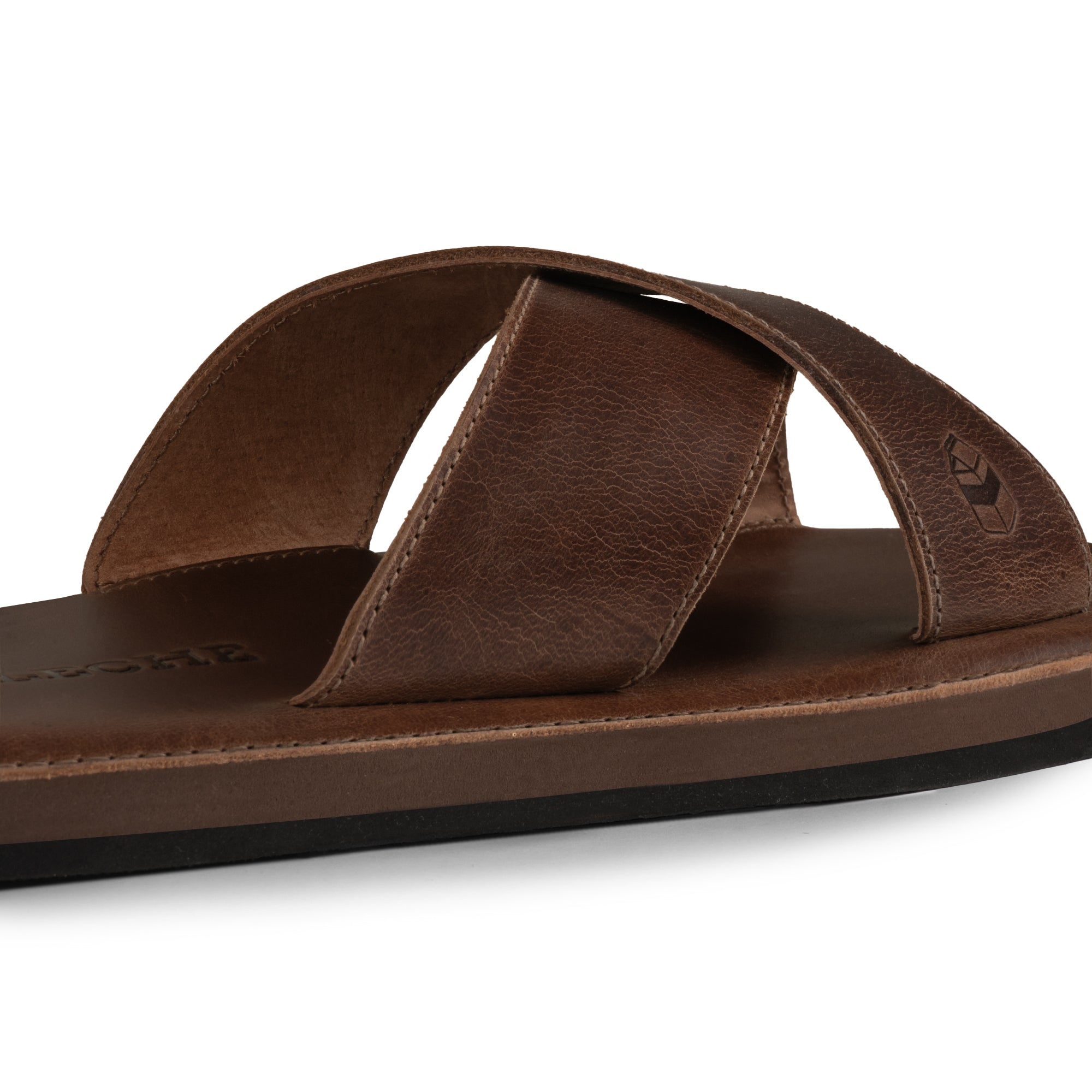 Close-up of The Wanderer Arch Comfort Sandals, featuring the soft, flexible design that ensures comfort and style. Made by La Leche from Full Grain Leather with memory foam support, these sandals are perfect for any occasion—handmade in La Antigua Guatemala and Oaxaca Mexico, signifying superior artisan craftsmanship.