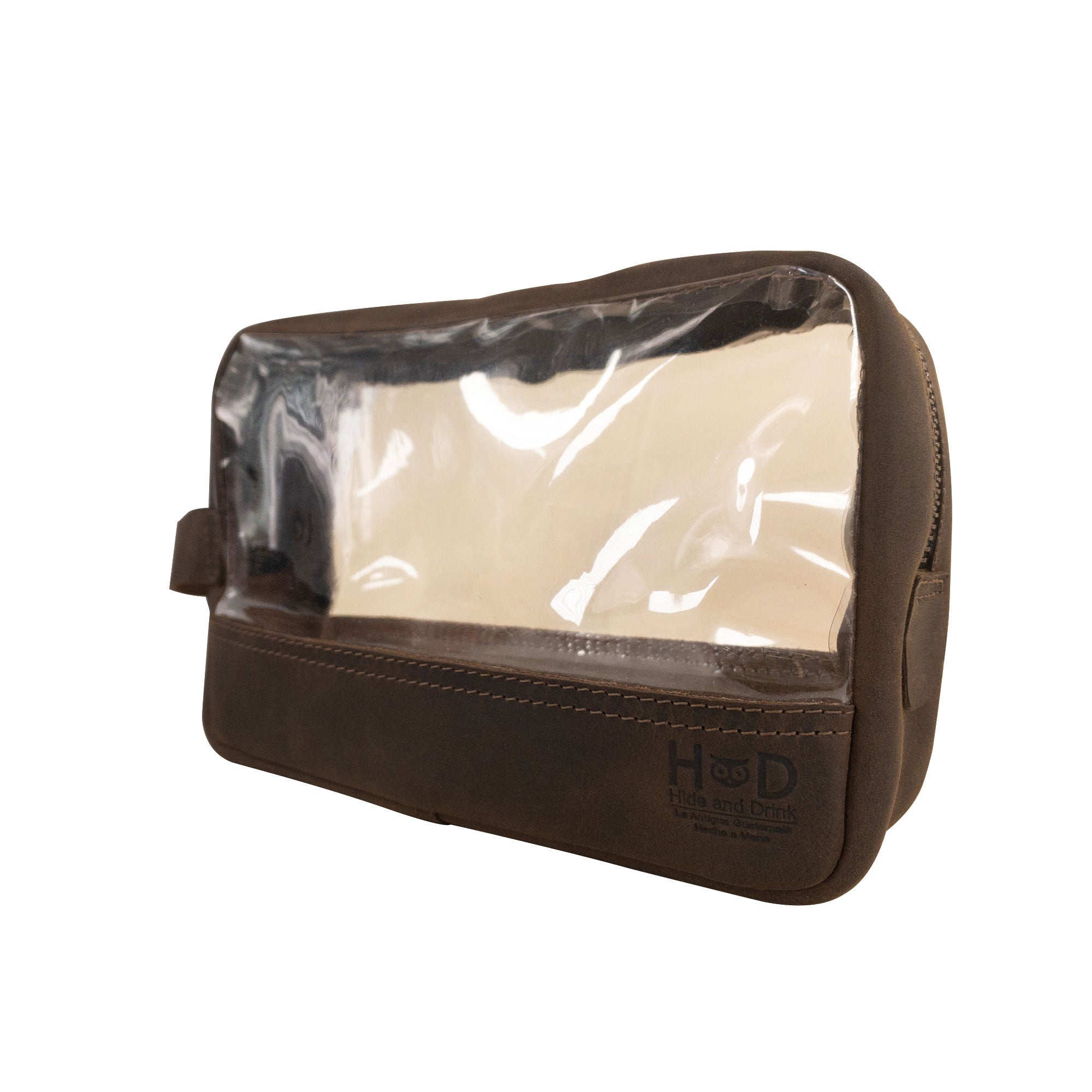 Another angle of Hide & Drink Transparent Bag for Makeup, showcasing its functional design and clear window, made from durable Full Grain Leather, ideal as a travel organizer pouch crafted through small batch production by artisans in La Antigua Guatemala & Oaxaca Mexico.