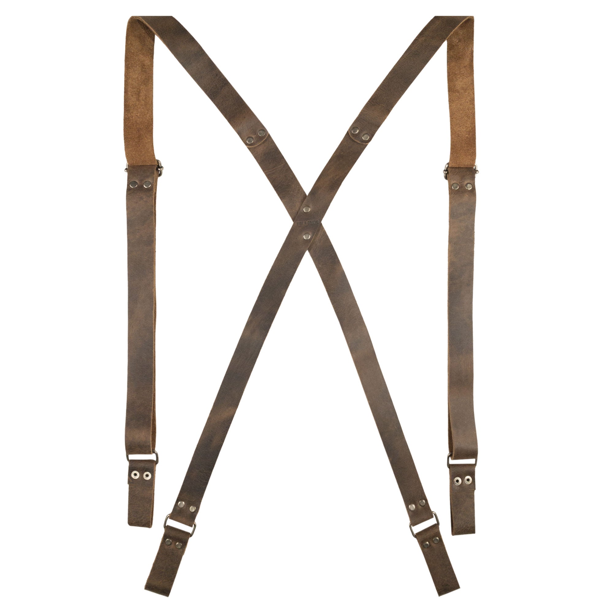 Flat lay of Riveted X Back Suspenders with Belt Loops by Hide & Groom, showcasing the unique leather texture and functional design. Ideal for weddings, steampunk, and everyday wear, these artisan-made suspenders highlight small batch production and premium quality.