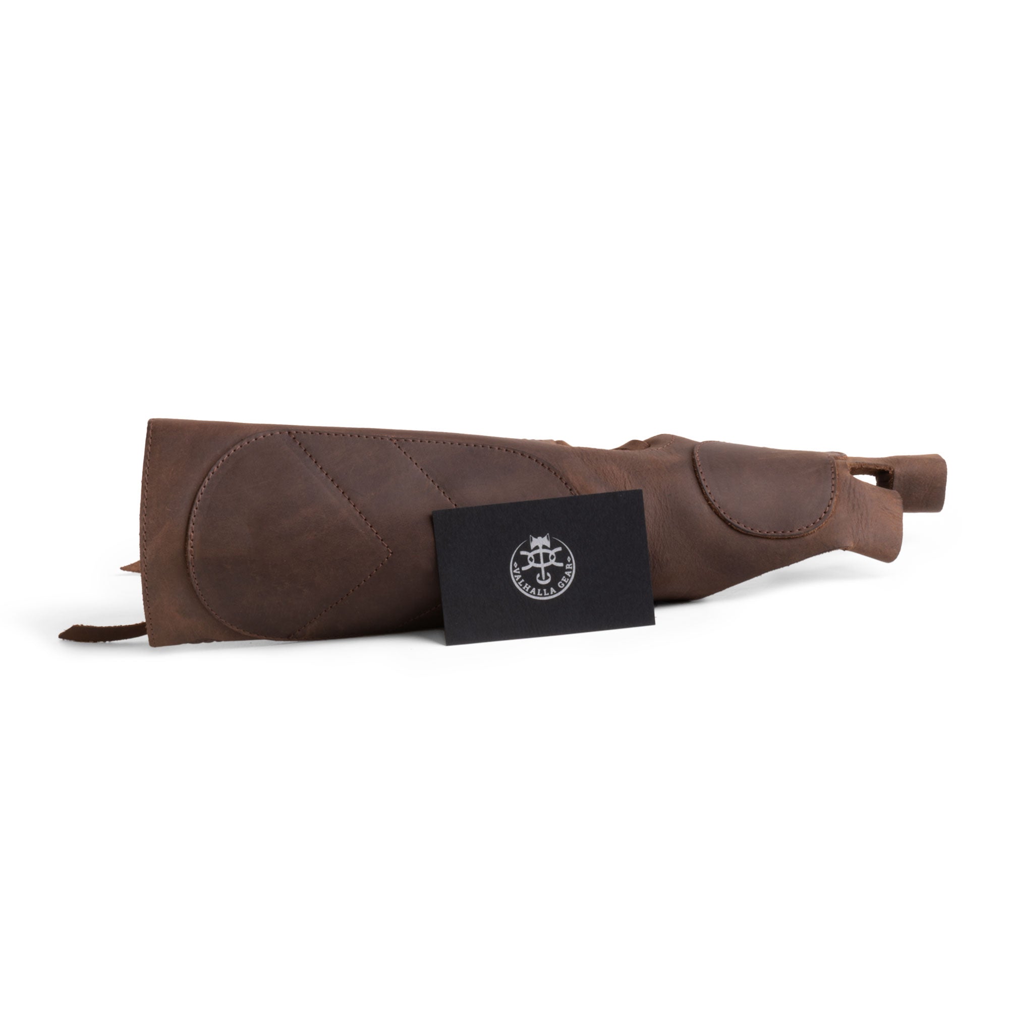 The Forearm Guard for Archers by Valhalla Gear, displayed alongside a branding card. This handmade leather product exemplifies artisan craftsmanship and durability, perfect for protective bracer needs. Ideal for archers looking for reliable full grain leather arm guards, made with passion in La Antigua Guatemala.