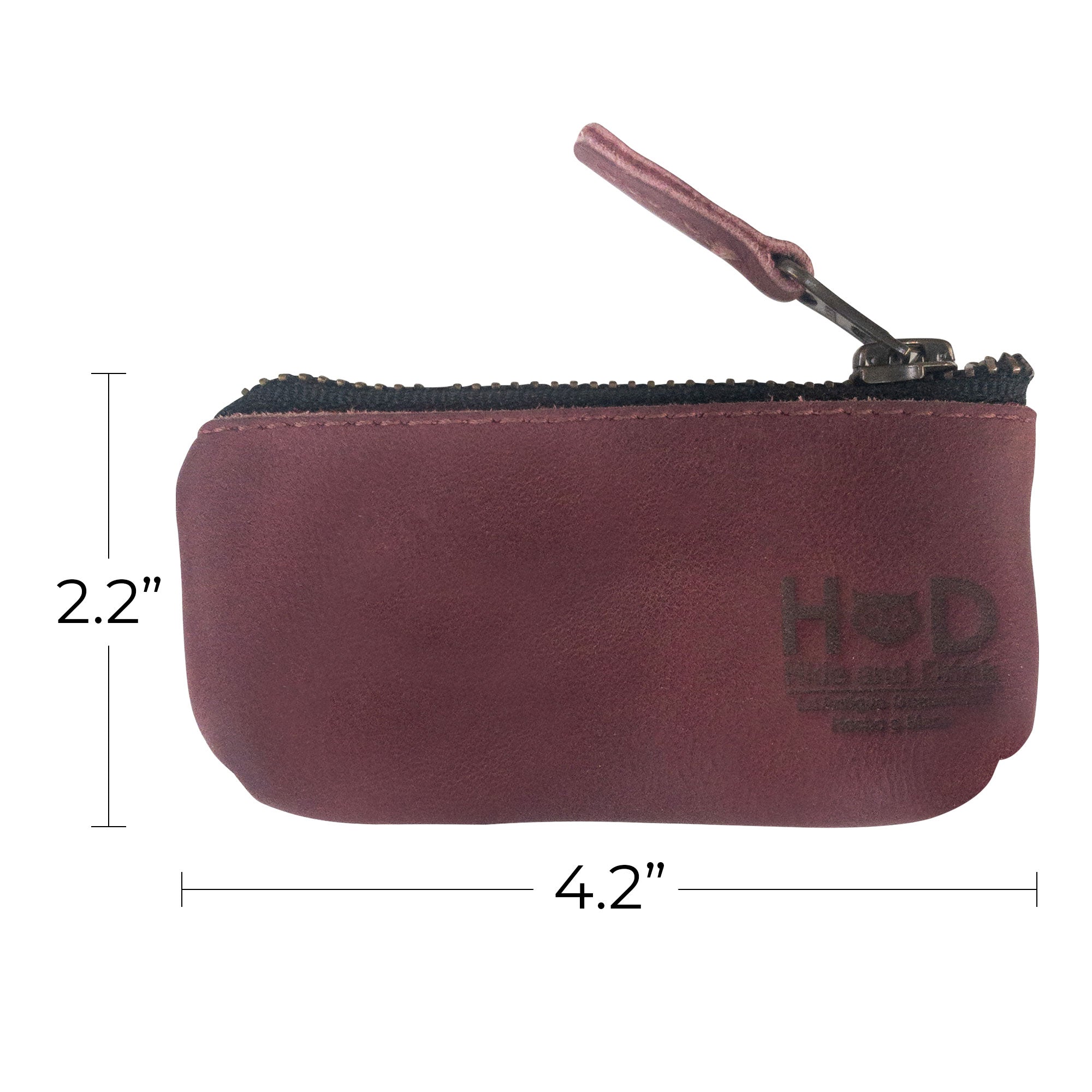 Hide & Drink Key Holder Zippered Pouch displaying sleek design and craftsmanship in full grain leather. Ideal for organizing money, charging cables, or memory cards.